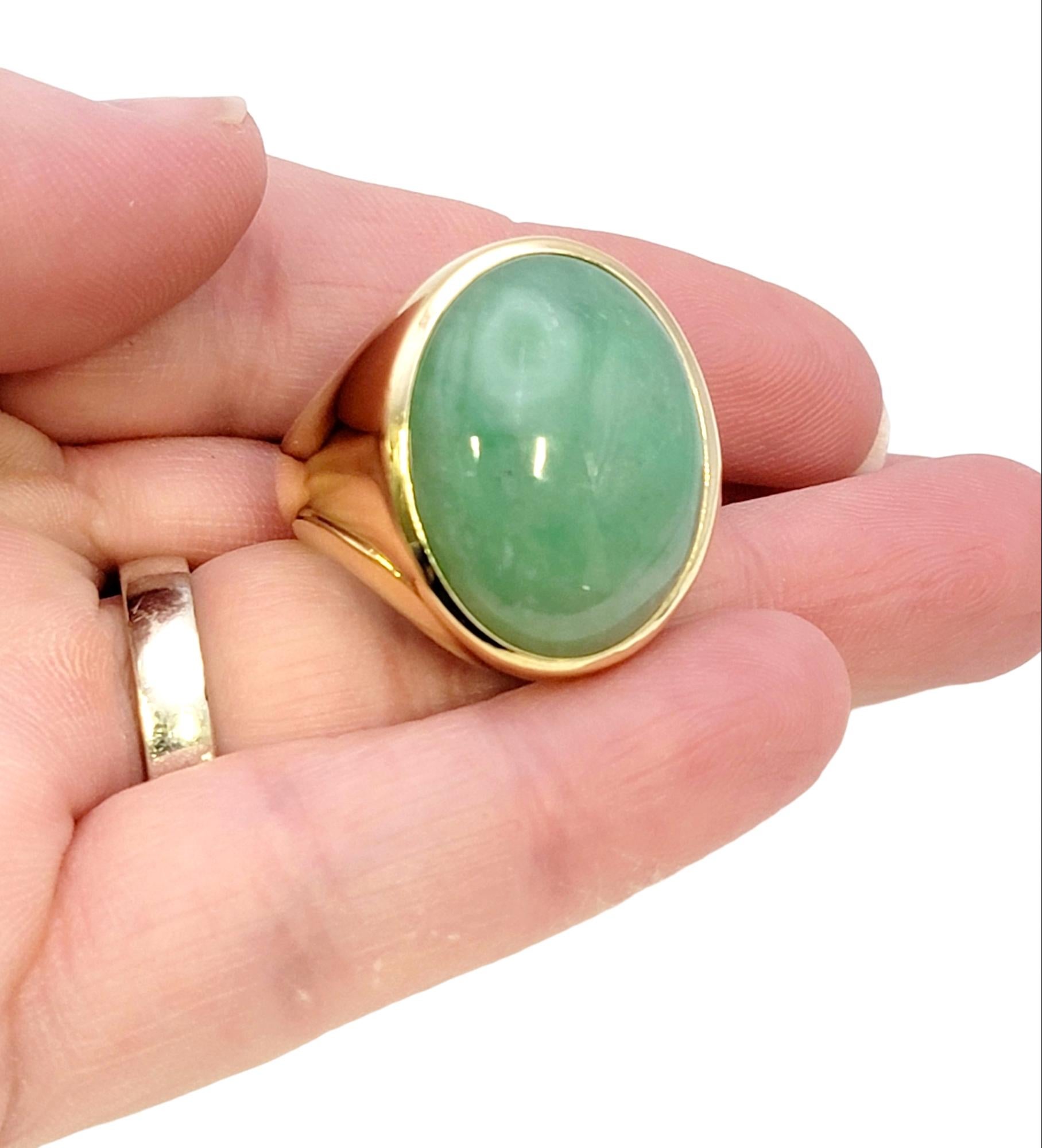 Solitaire Oval Cabochon Light Green Jadeite Ring in 14 Karat Yellow Gold Unisex For Sale 6