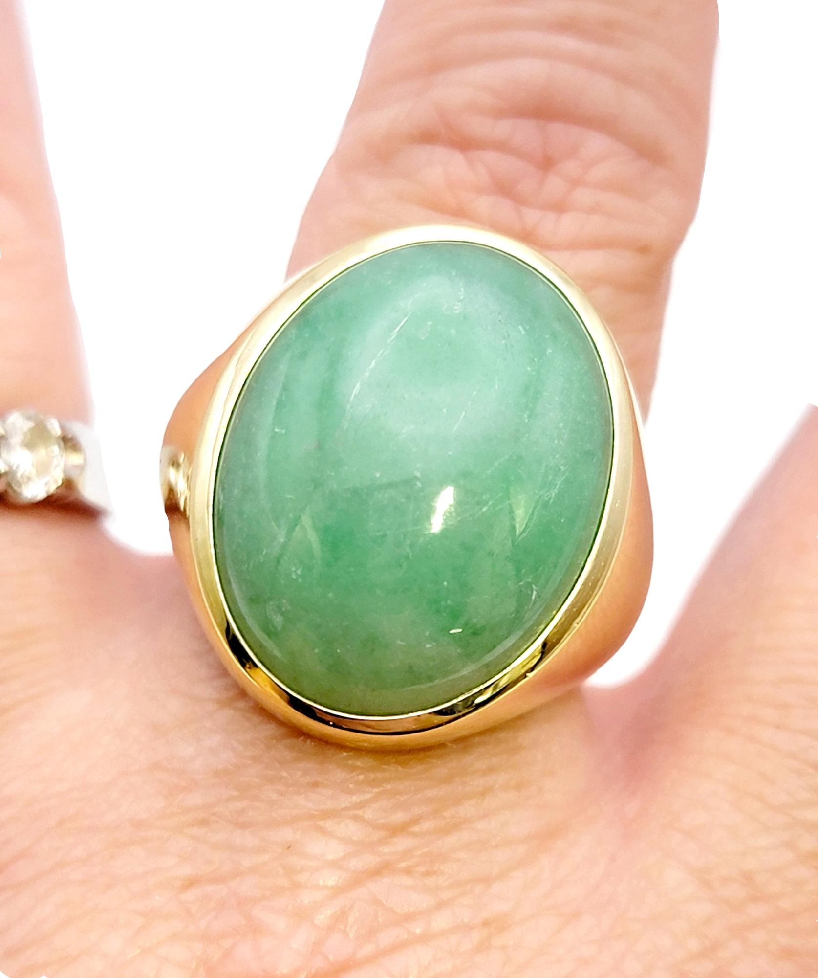Solitaire Oval Cabochon Light Green Jadeite Ring in 14 Karat Yellow Gold Unisex For Sale 7