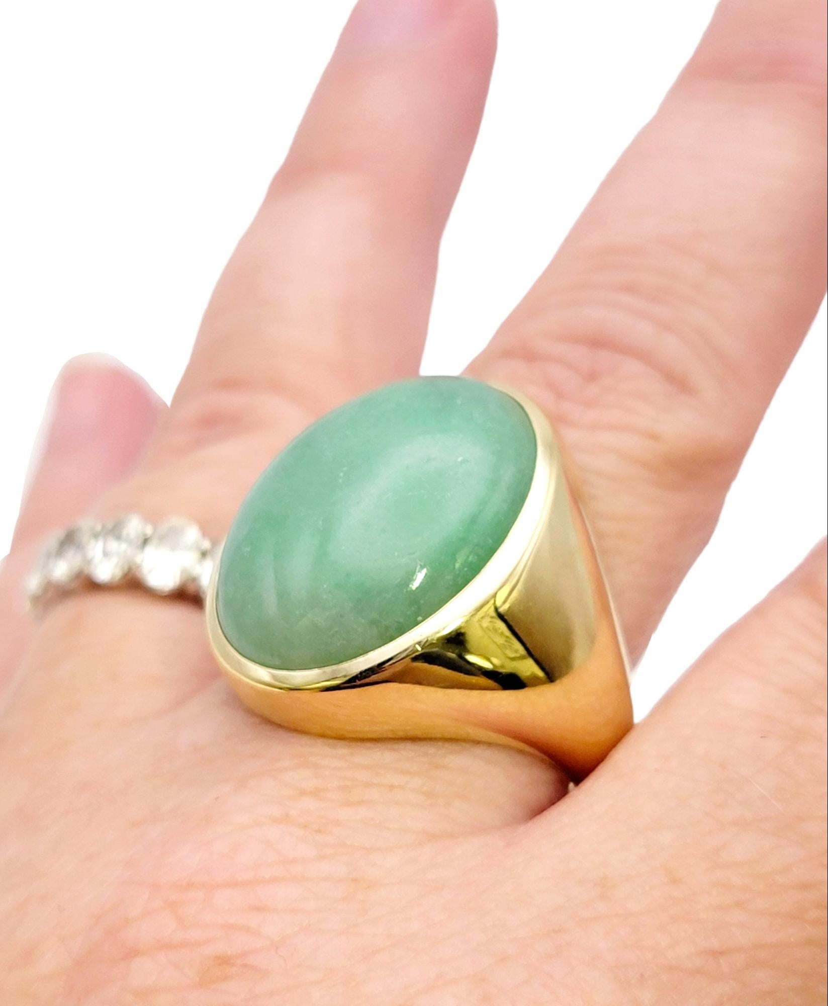 Solitaire Oval Cabochon Light Green Jadeite Ring in 14 Karat Yellow Gold Unisex For Sale 8