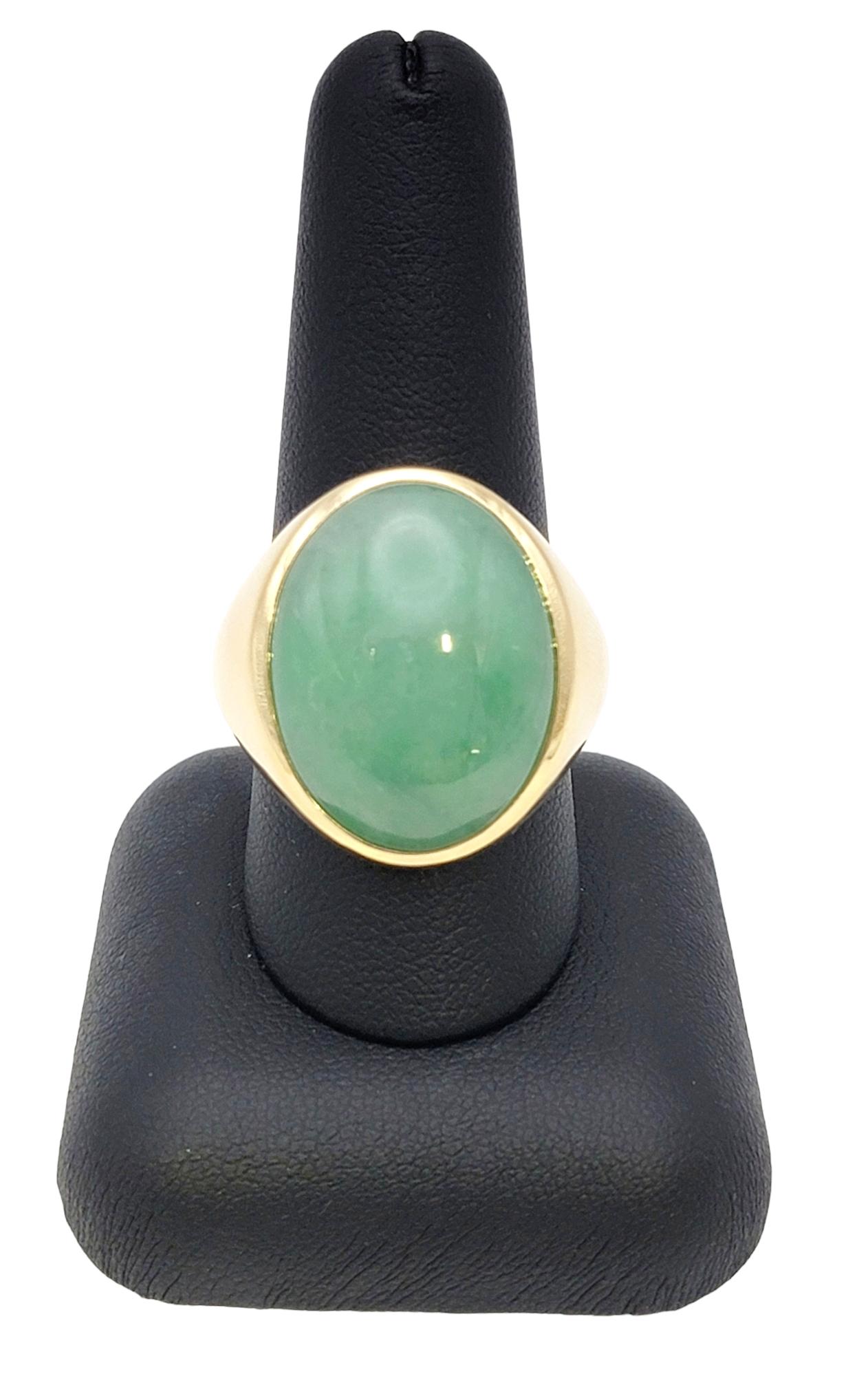 Solitaire Oval Cabochon Light Green Jadeite Ring in 14 Karat Yellow Gold Unisex For Sale 9