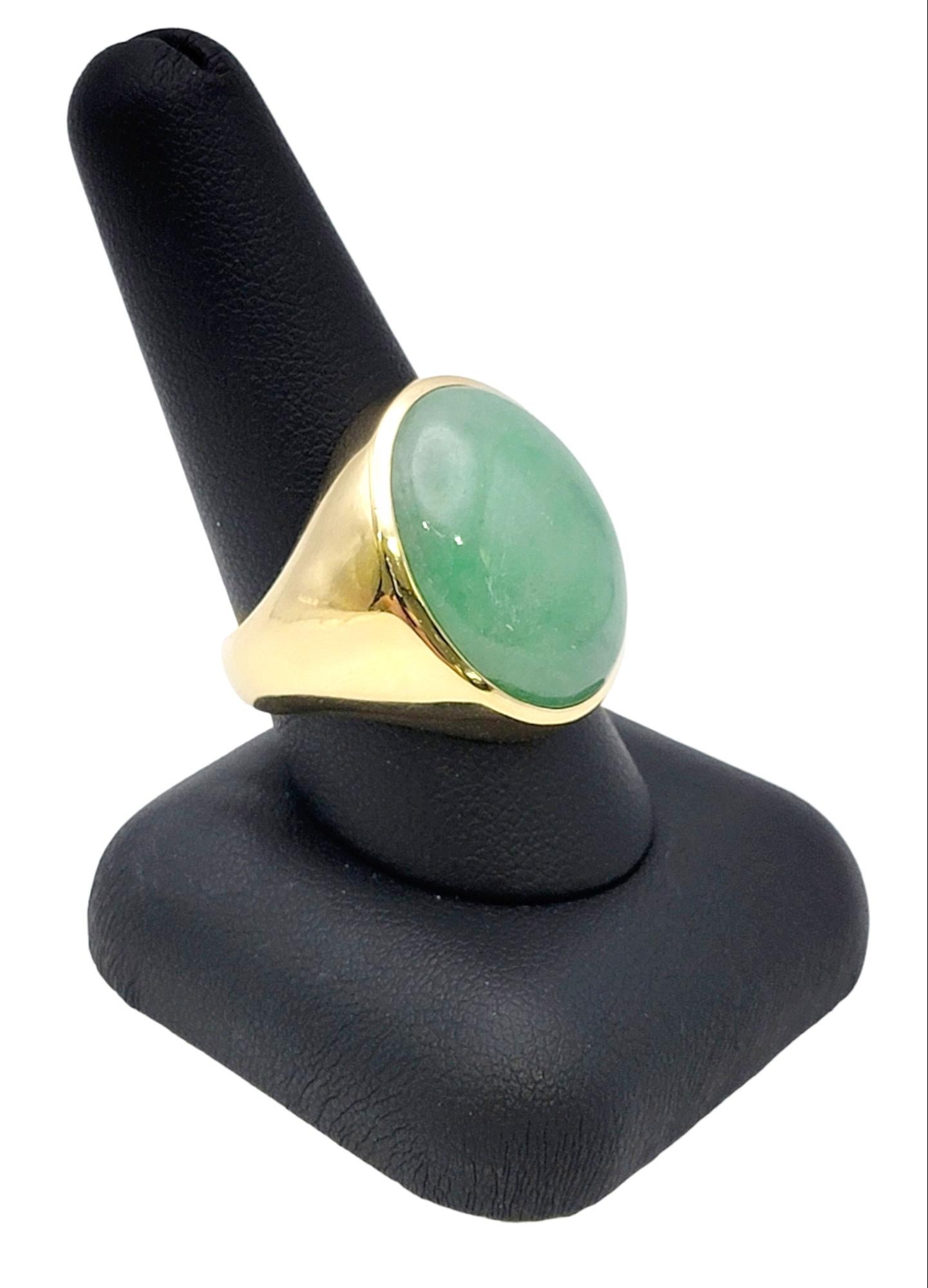 Solitaire Oval Cabochon Light Green Jadeite Ring in 14 Karat Yellow Gold Unisex For Sale 10