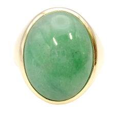 Oval Cabochon Light Green Jadeite Unisex Cocktail Ring in 14 Karat Yellow Gold