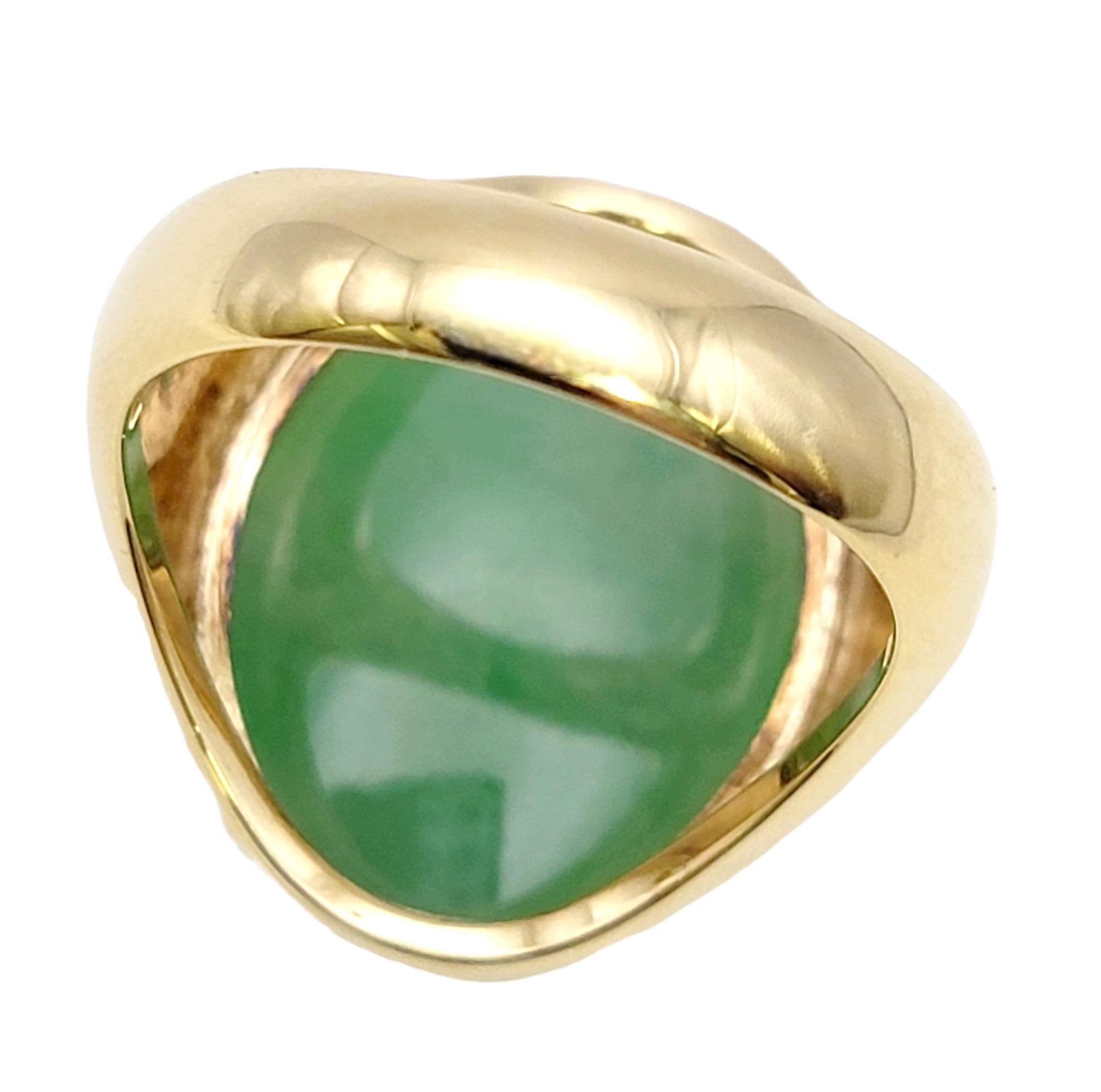 Solitaire Oval Cabochon Light Green Jadeite Ring in 14 Karat Yellow Gold Unisex In Good Condition For Sale In Scottsdale, AZ