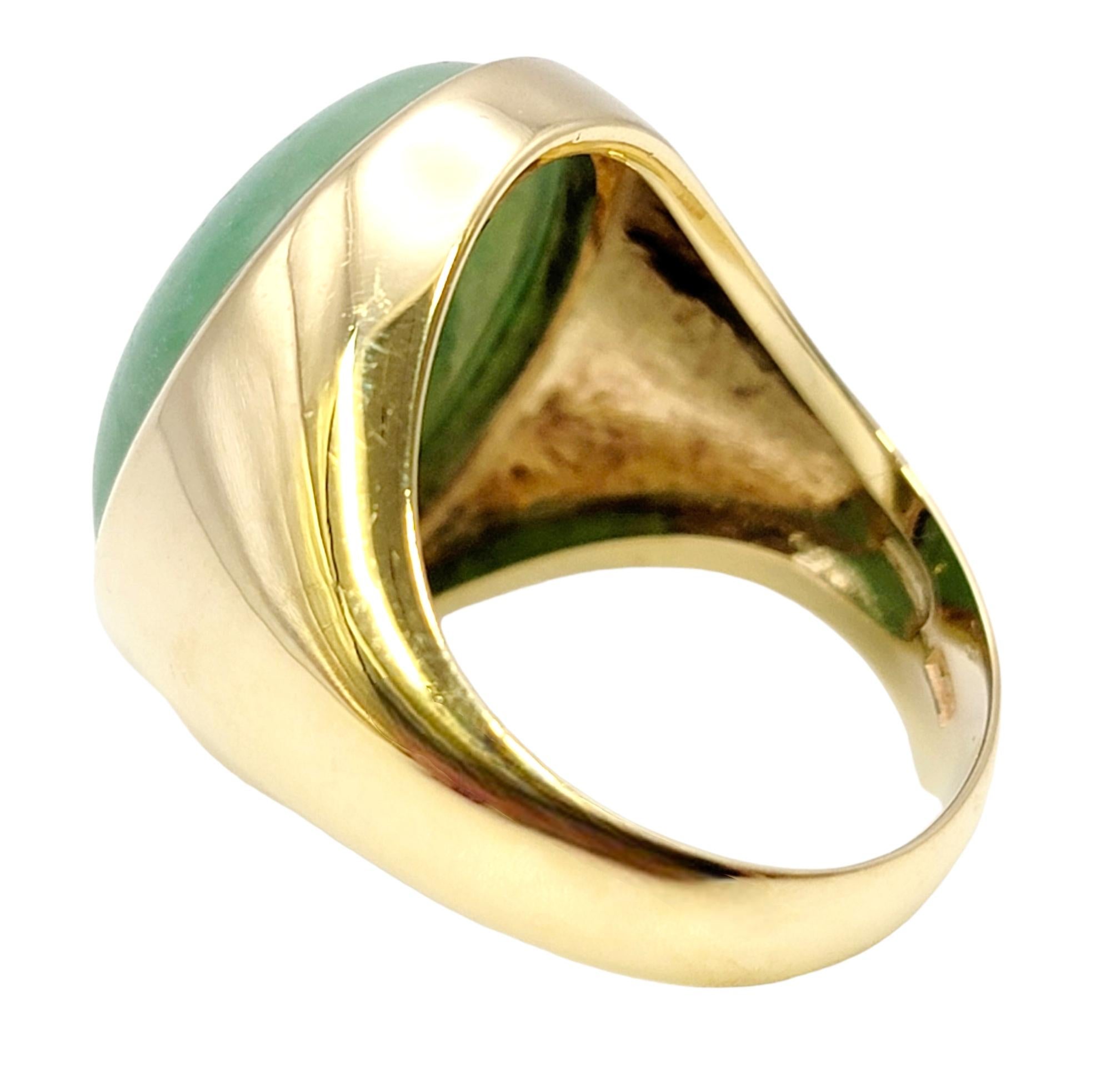 Solitaire Oval Cabochon Light Green Jadeite Ring in 14 Karat Yellow Gold Unisex For Sale 1