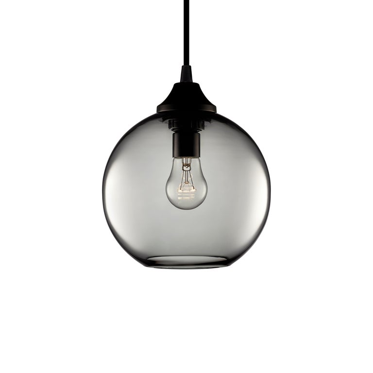 Brought to our line by popular demand, the Solitaire Petite pendant is the smaller version of Niche's Classic spherical silhouette. When coupled together, the bulb at the centre of this pendant accentuates enduring quality and beauty. Every single