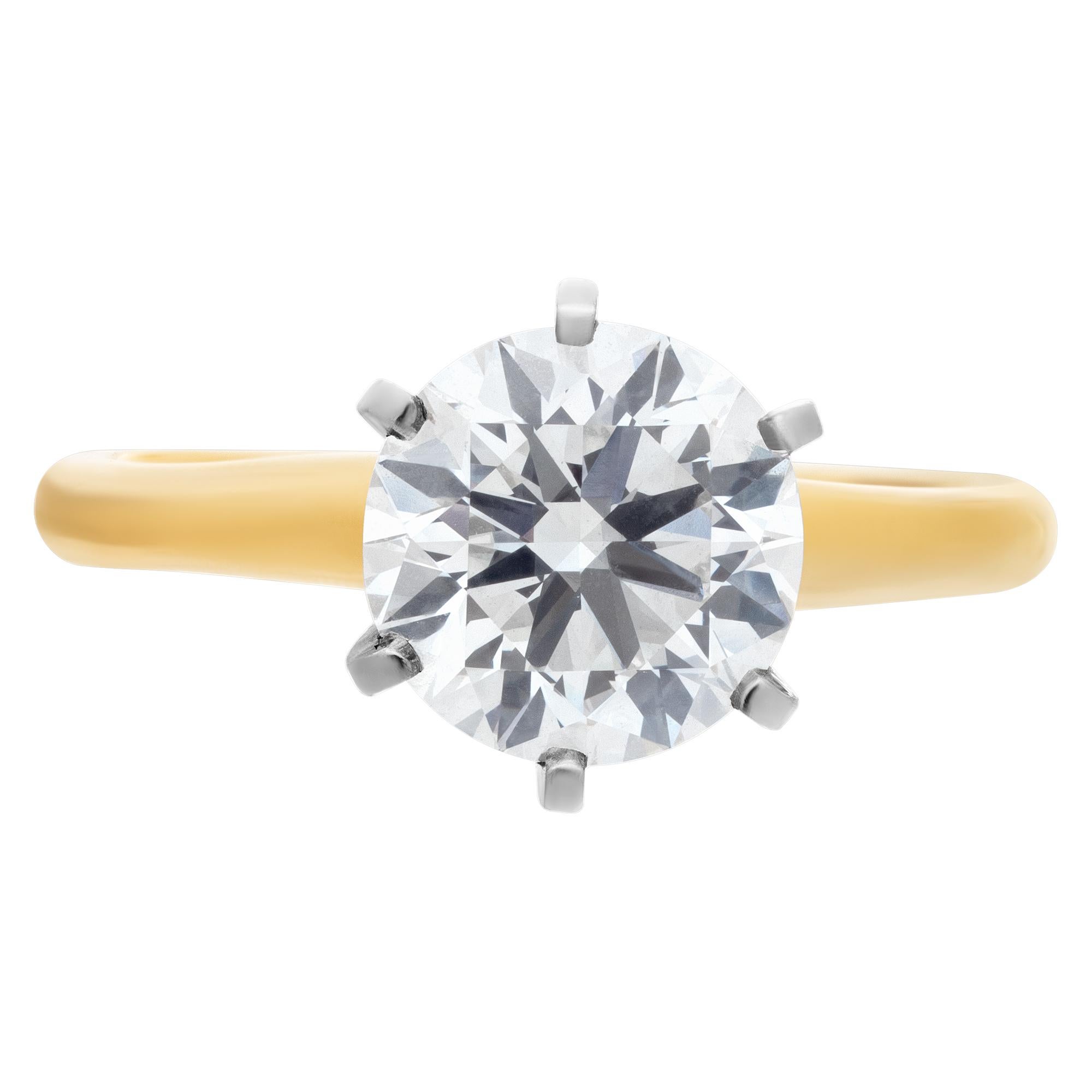 GIA certified round brilliant cut diamond 2.02 carat (G color, VVS2 clarity) solitaire ring set in 14k yellow gold setting with white gold 6 prongs. Size 6

This GIA certified ring is currently size 6 and some items can be sized up or down, please