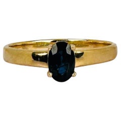 Solitaire Ring 18k Yellow Gold with Oval Dark Blue Sapphire 0.40 carat