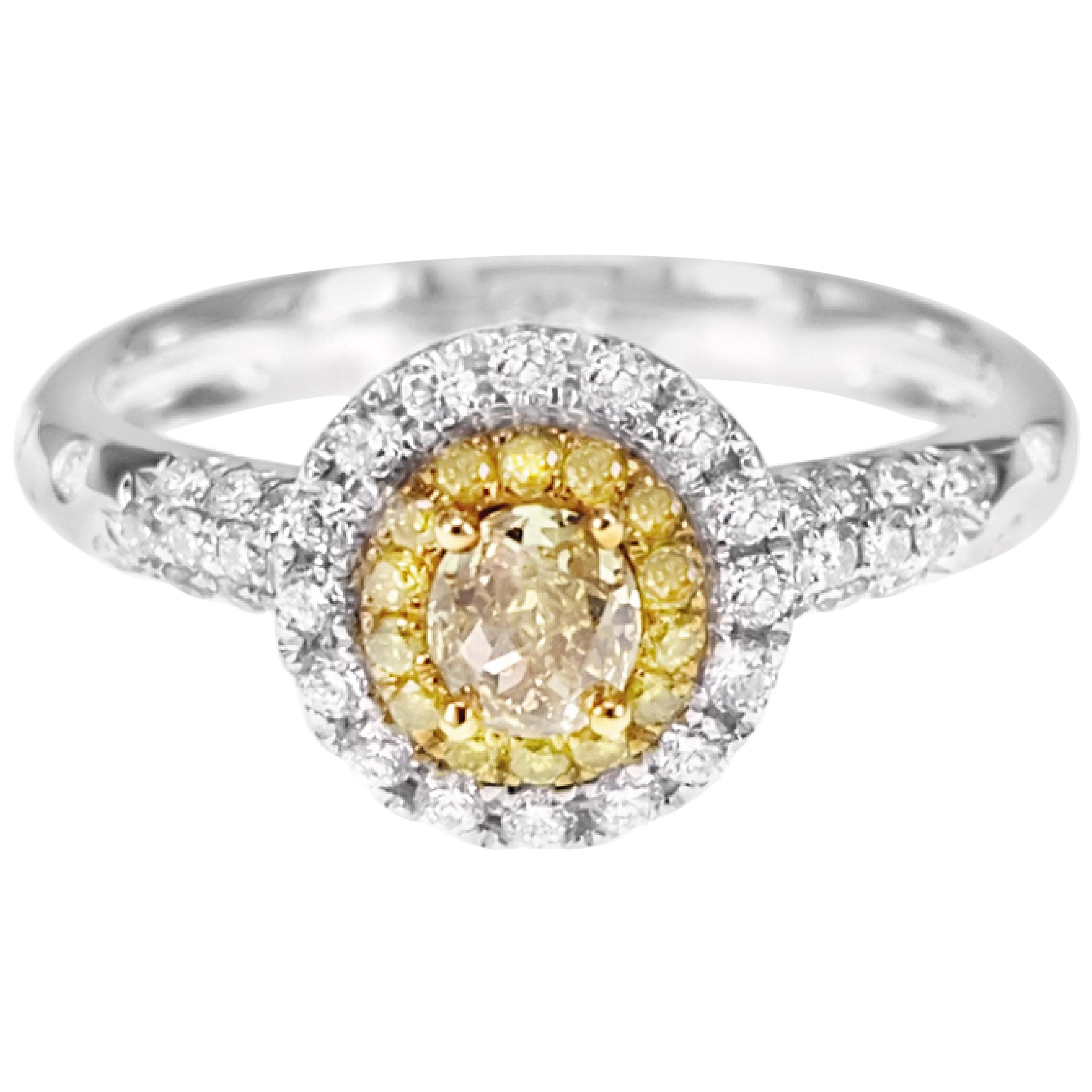 Solitaire Ring Consisting Intense Yellow and White Diamond For Sale