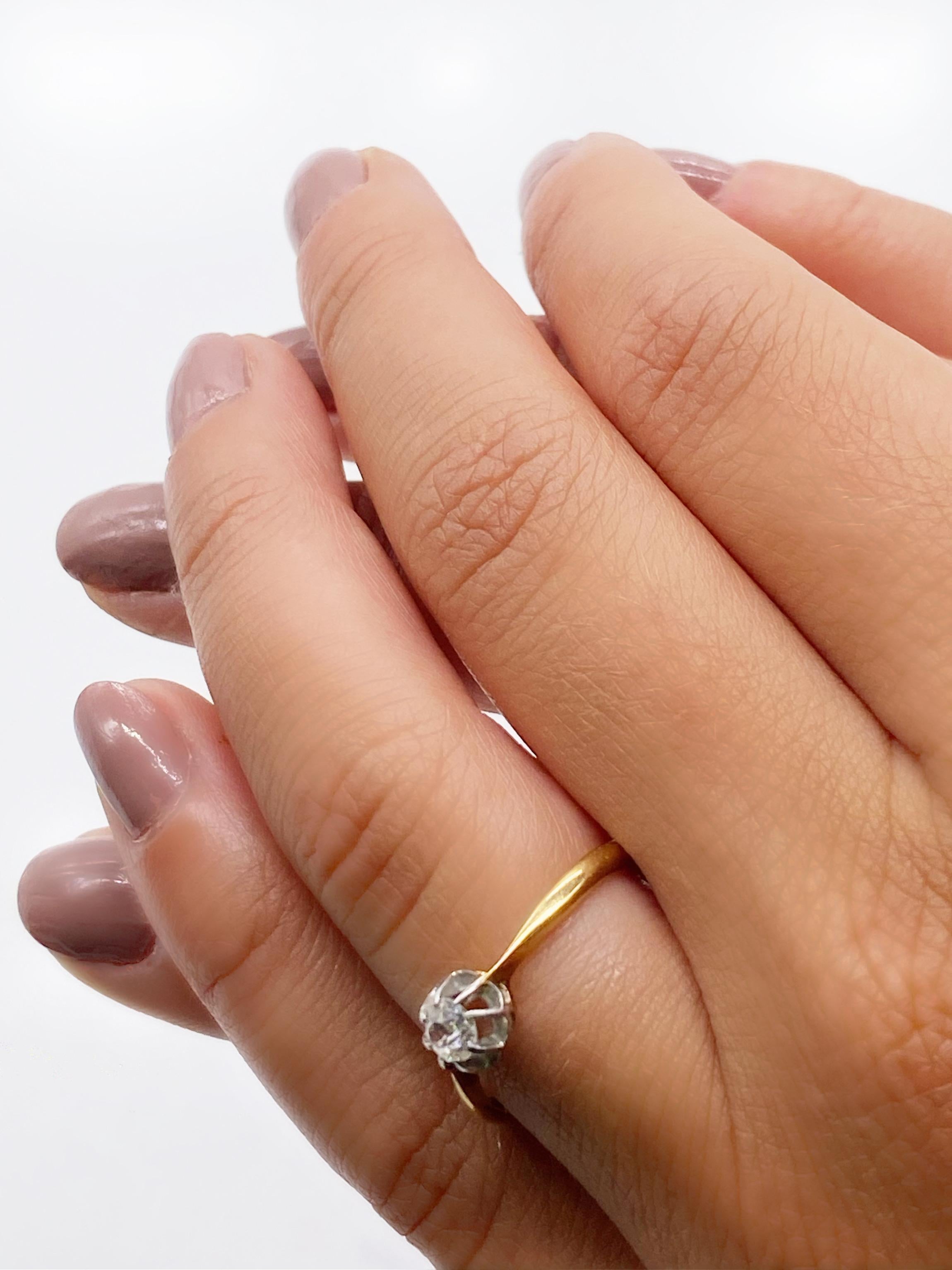 Discover our magnificent solitaire in 18K Yellow Gold and White Gold, a creation of timeless elegance, enhanced by a diamond of rare beauty.

The diamond, a precious gem carefully cut in a rose gold shine, shines with all its brilliance in the