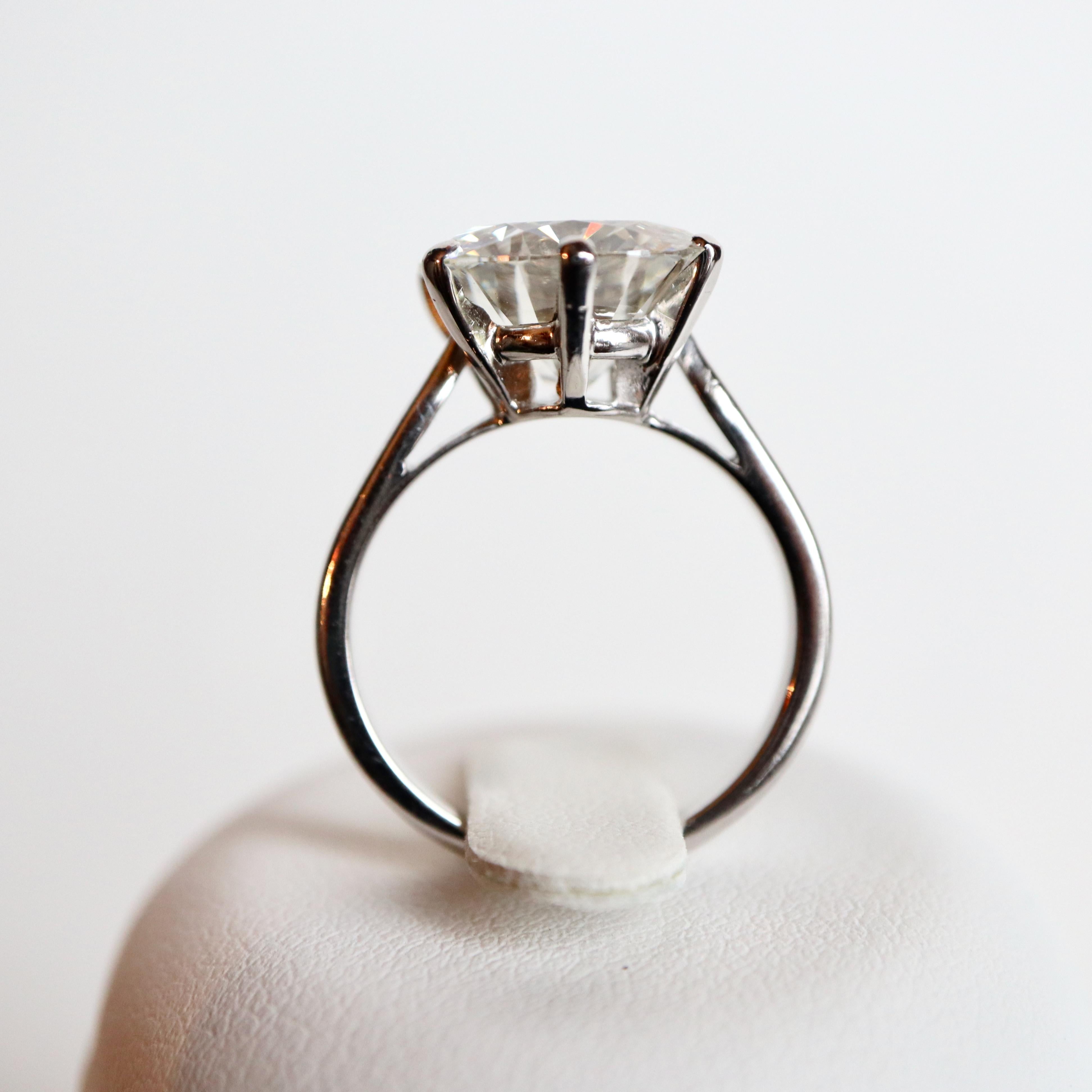 Brilliant Cut Solitaire Ring with a 5.23 Carat Diamond in the Center For Sale