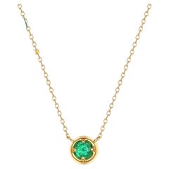 Collana con smeraldo rotondo solitario in oro giallo 14K