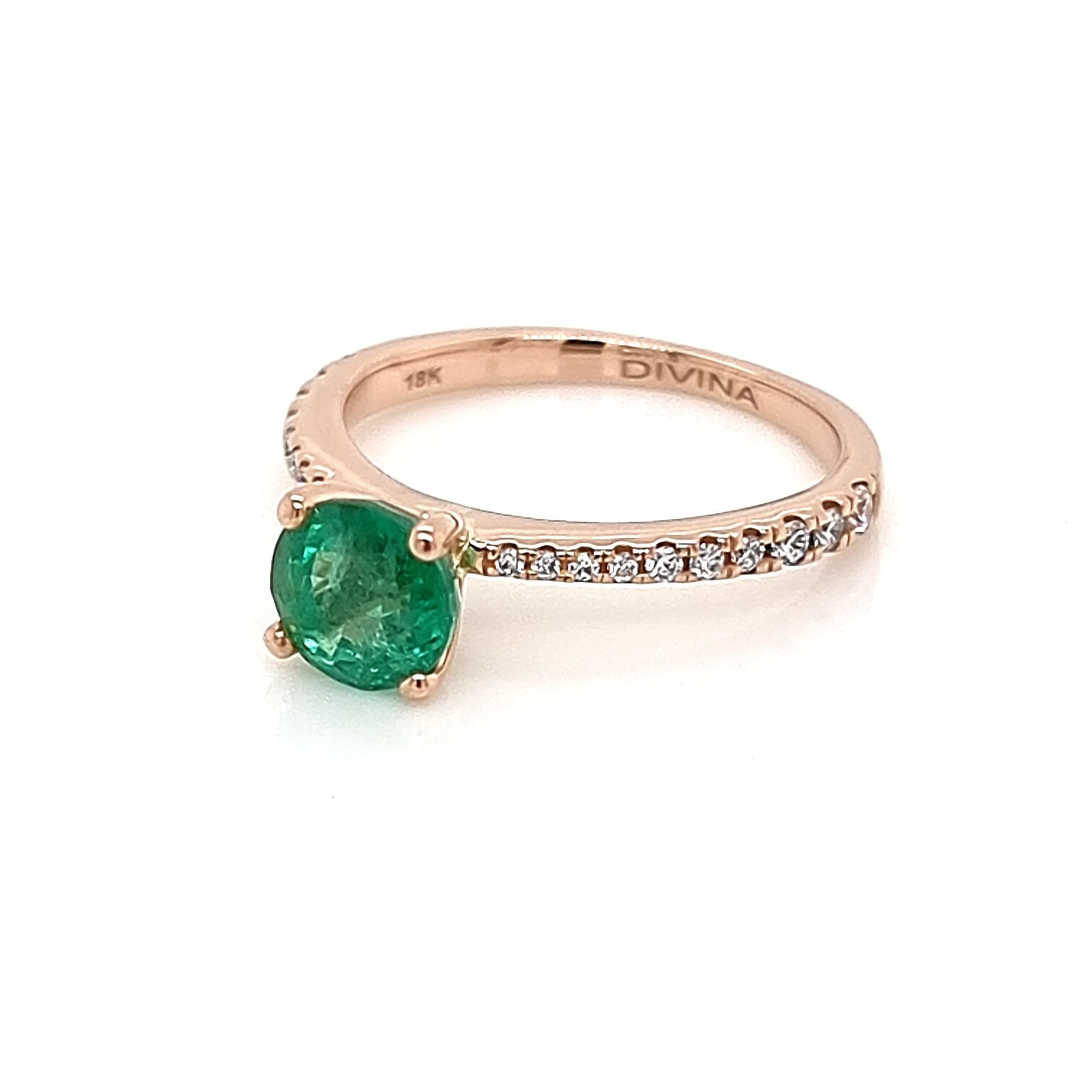 Step into the realm of timeless beauty with the Classic Solitaire 18K Rose Gold Ring, an enchanting piece that centers around a mesmerizing 6.00 mm round emerald. This captivating gemstone exudes a radiant allure that gracefully captures the heart.