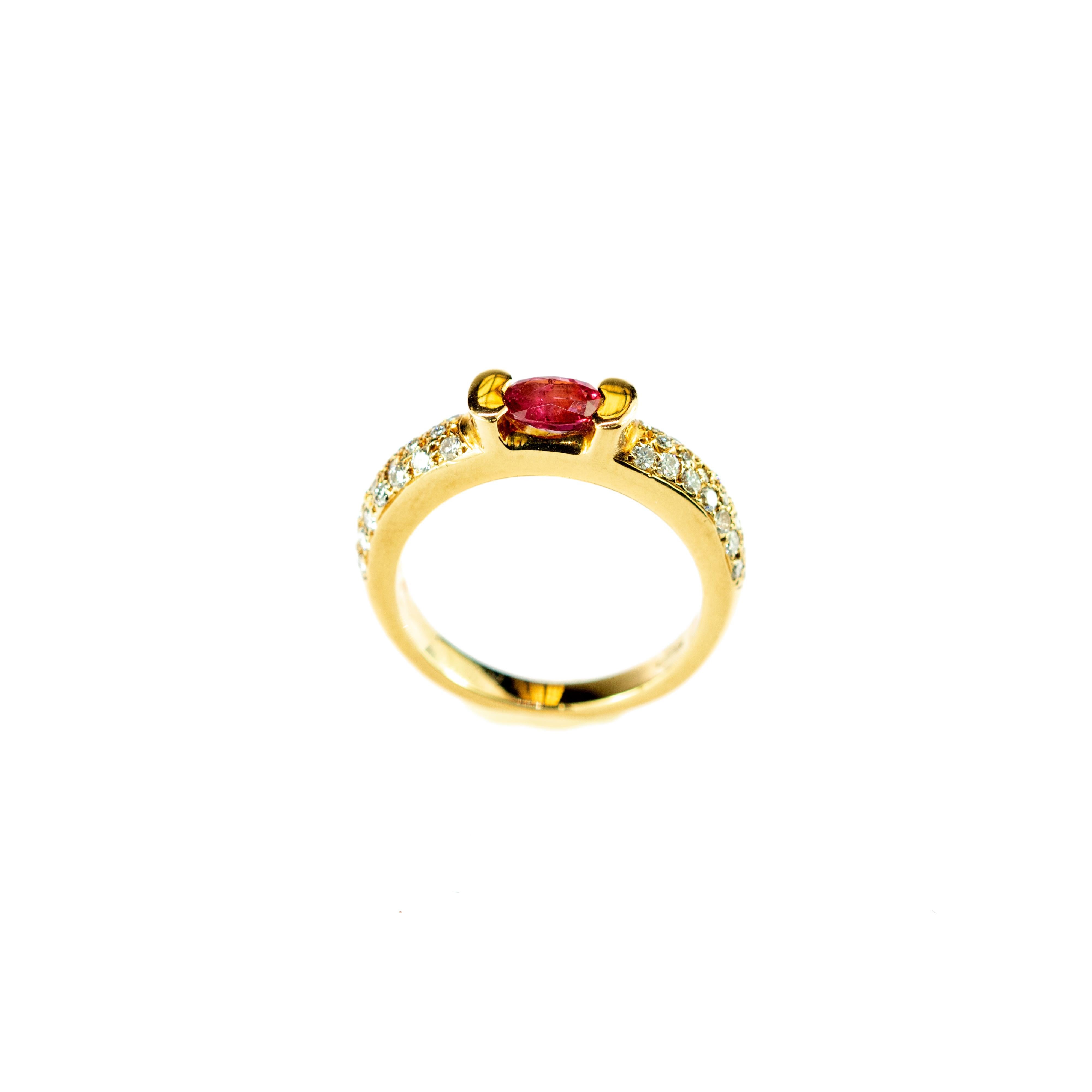 Vintage cabochon ruby engagement ring with diamonds subtly united by 18 karat gold. This is an antique ring style with a romantic Victorian influence.
 
This jewel is inspired by romanticism and passion. It has delicate touches adding each gem in a