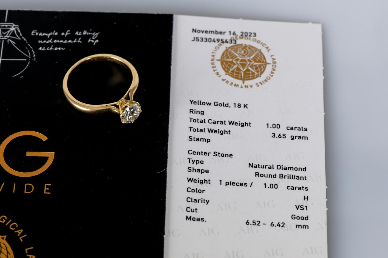 Solitär-Hochzeitsring aus 18 Karat Gold mit 1 rundem Diamanten im Brillantschliff im Angebot 6