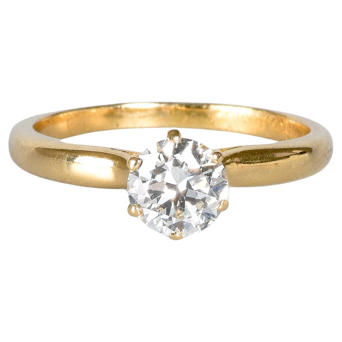 Solitär-Hochzeitsring aus 18 Karat Gold mit 1 rundem Diamanten im Brillantschliff im Angebot