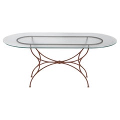 Mesa de exterior ovalada de cristal y hierro forjado Solivo de Dante Negro