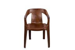 Sol&Luna, Poltrona in pelle marrone, Opera contemporanea