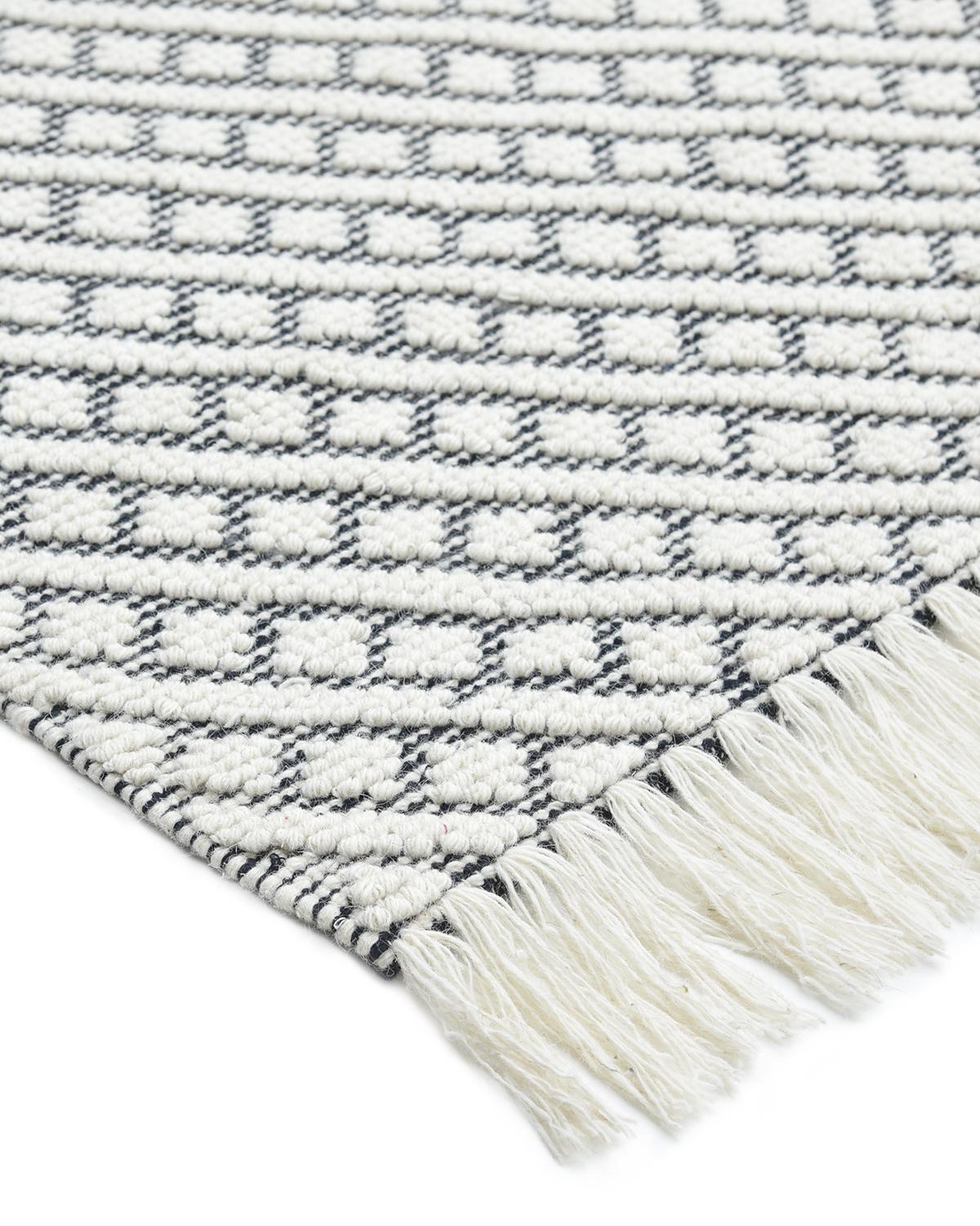 Durable and low-maintenance, flatweave rugs are especially popular for high-traffic rooms and in households with children and pets. The handwoven rugs in the Flatweave collection are beautiful as well as practical. Their quiet patterns and