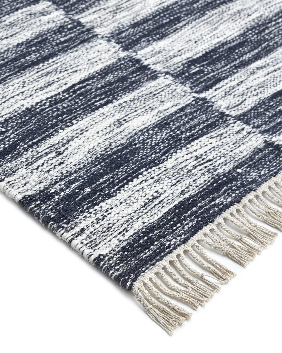 Durable and low-maintenance, flatweave rugs are especially popular for high-traffic rooms and in households with children and pets. The handwoven rugs in the Flatweave collection are beautiful as well as practical. Their quiet patterns and