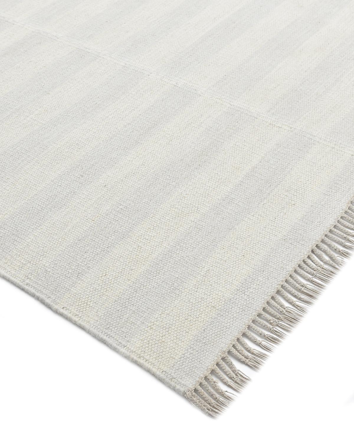 Durable and low-maintenance, flatweave rugs are especially popular for high-traffic rooms and in households with children and pets. The handwoven rugs in the Flatweave collection are beautiful as well as practical. Their quiet patterns and