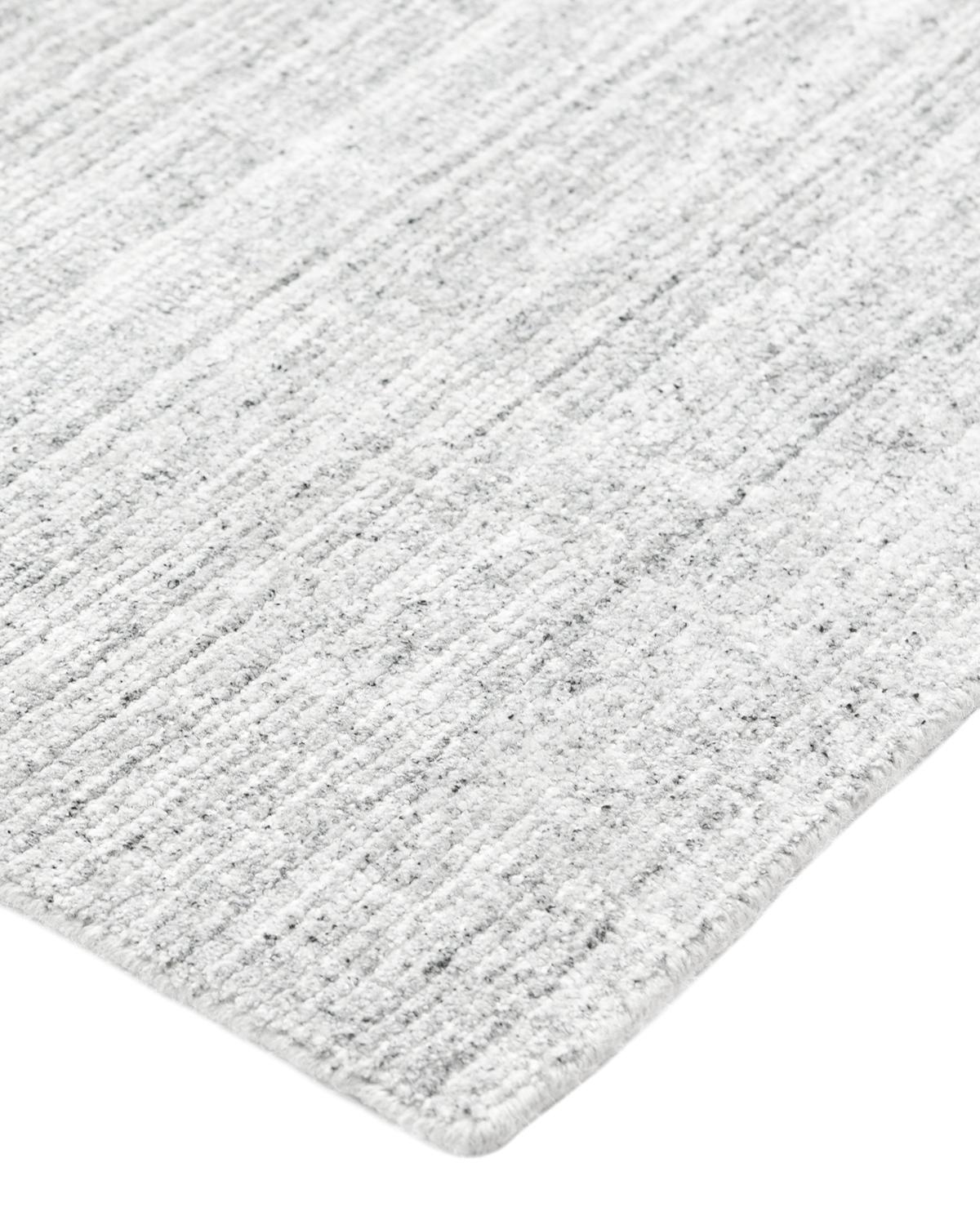 Subtle tone-on-tone stripes give the Solid collection a depth and sophistication all its own. These rugs can pull the disparate elements of a room into a beautifully cohesive whole; they can also introduce an unexpected but welcome jolt of color