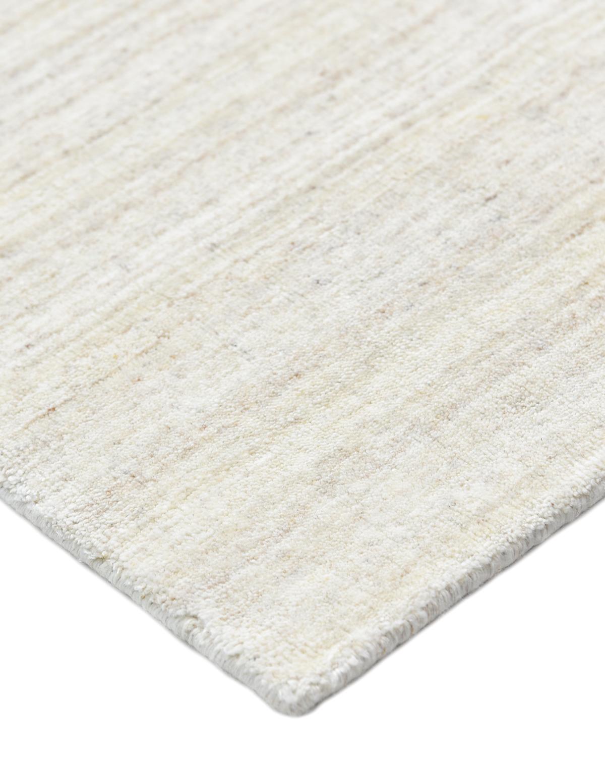 Subtle tone-on-tone stripes give the solid collection a depth and sophistication all its own. These rugs can pull the disparate elements of a room into a beautifully cohesive whole; they can also introduce an unexpected but welcome jolt of color