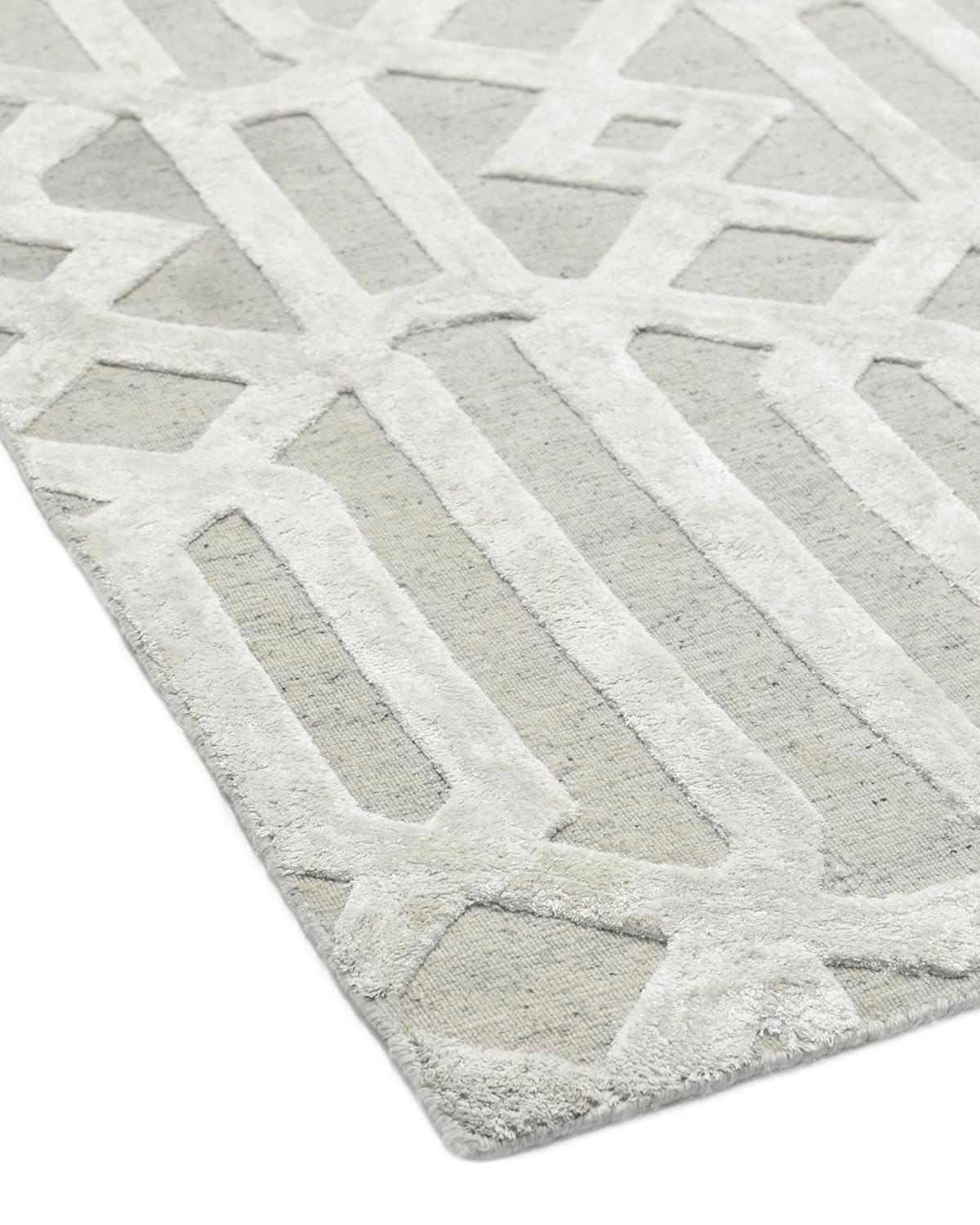 Bridging the gap between traditional and modern, the Transitional collection features rugs that exemplify versatility. They incorporate both time-honored motifs and, courtesy of 100%-natural botanical dyes, contemporary colors. Hand-knotted using
