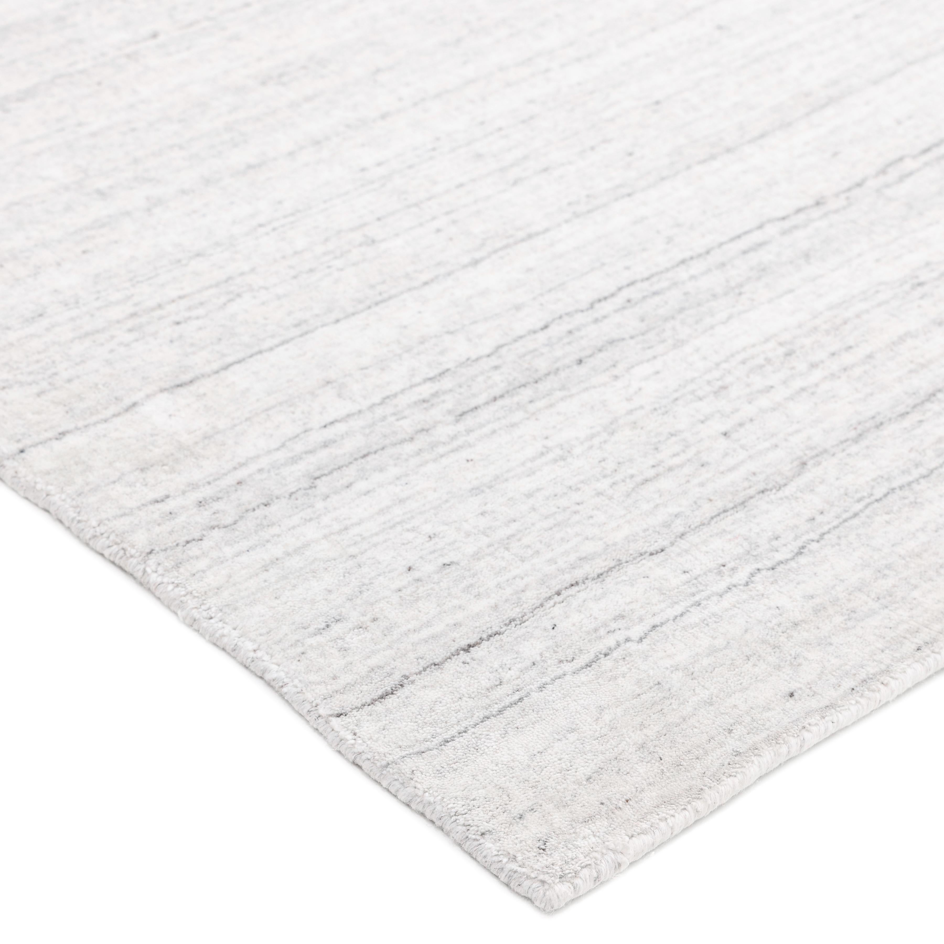 Subtle tone-on-tone stripes give the Solid collection a depth and sophistication all its own. These rugs can pull the disparate elements of a room into a beautifully cohesive whole; they can also introduce an unexpected but welcome jolt of color