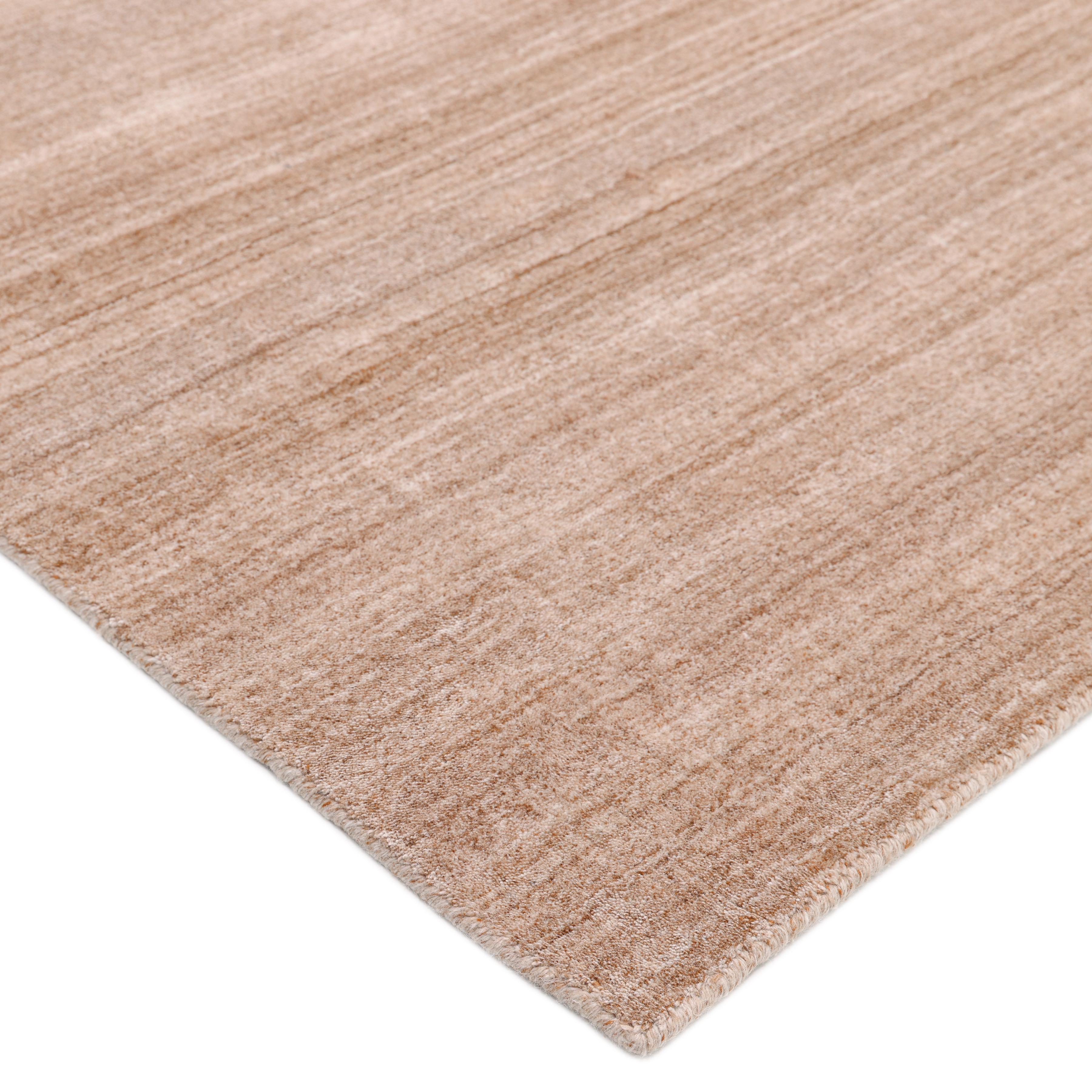 Subtle tone-on-tone stripes give the Solid collection a depth and sophistication all its own. These rugs can pull the disparate elements of a room into a beautifully cohesive whole; they can also introduce an unexpected but welcome jolt of color