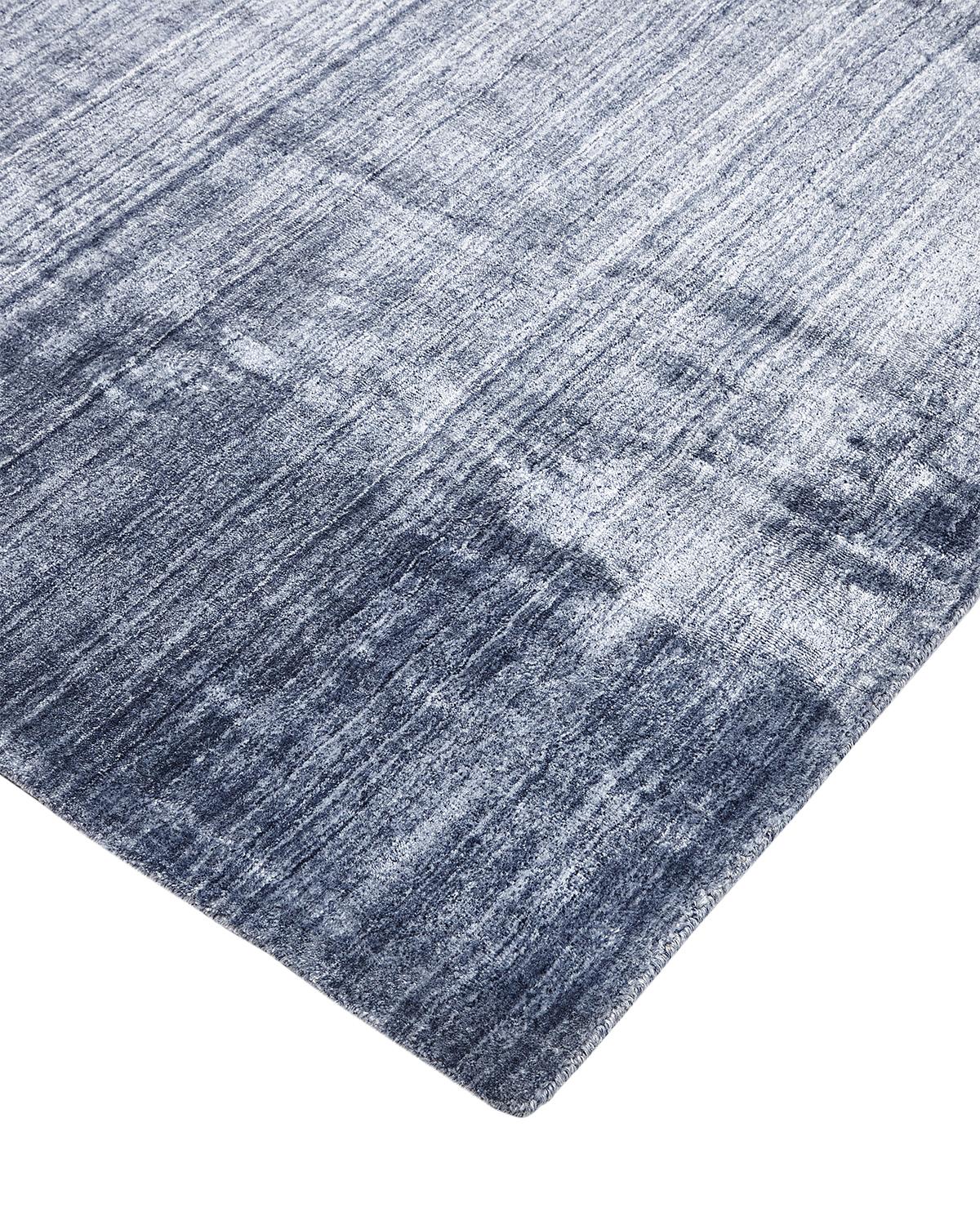 Subtle tone-on-tone stripes give the Solid collection a depth and sophistication all its own. These rugs can pull the disparate elements of a room into a beautifully cohesive whole; they can also introduce an unexpected but welcome jolt of color