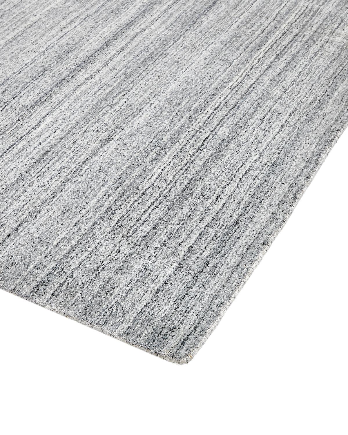 Subtle tone-on-tone stripes give the Solid collection a depth and sophistication all its own. These rugs can pull the disparate elements of a room into a beautifully cohesive whole; they can also introduce an unexpected but welcome jolt of color