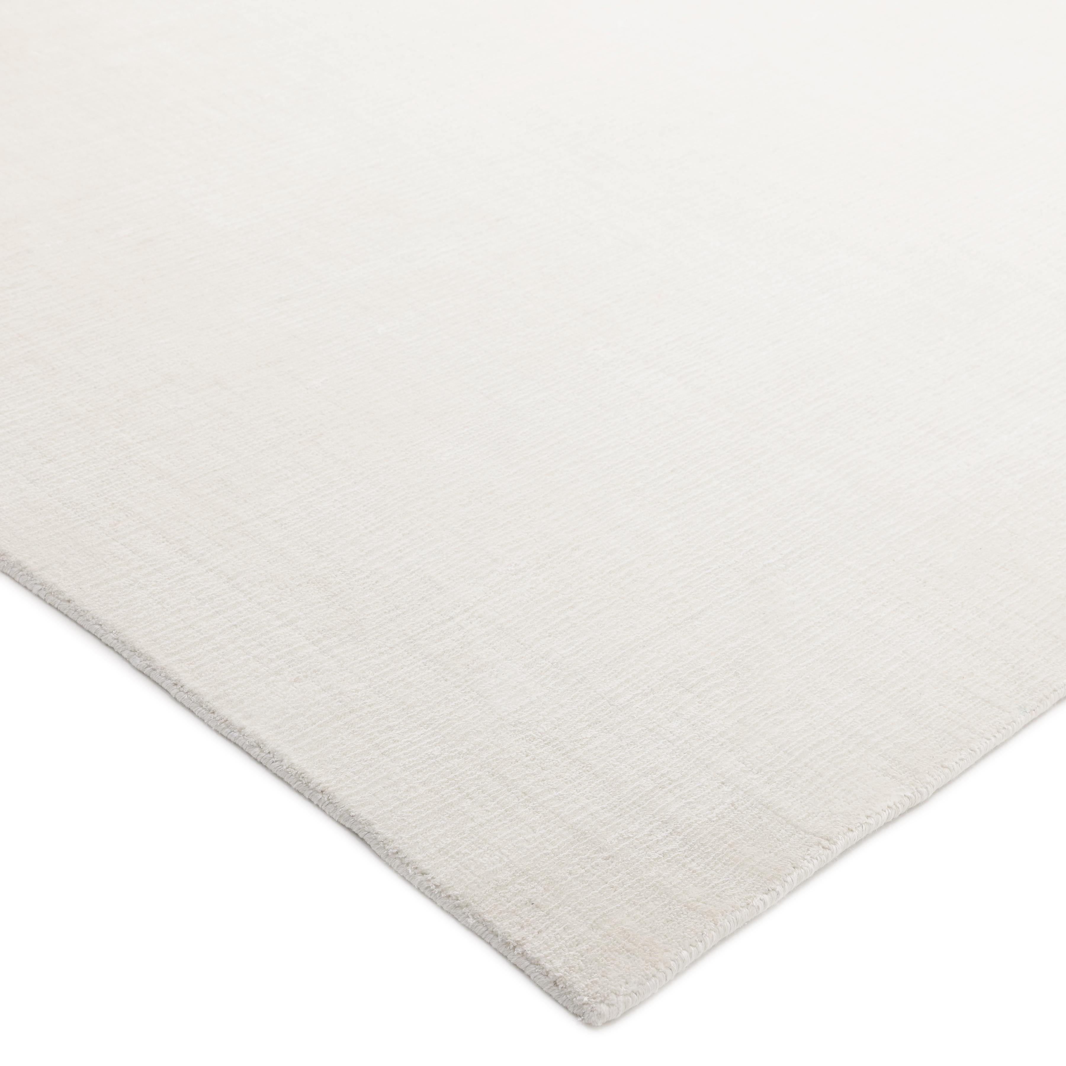 Subtle tone-on-tone stripes give the Solid collection a depth and sophistication all its own. These rugs can pull the disparate elements of a room into a beautifully cohesive whole; they can also introduce an unexpected but welcome jolt of color
