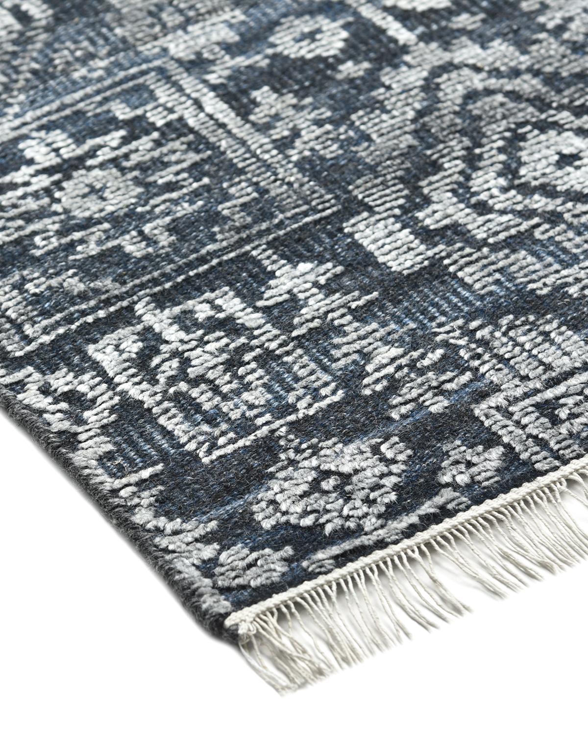 Bridging the gap between traditional and modern, the Transitional collection features rugs that exemplify versatility. They incorporate both time-honored motifs and, courtesy of 100%-natural botanical dyes, contemporary colors. Hand-Knotted using