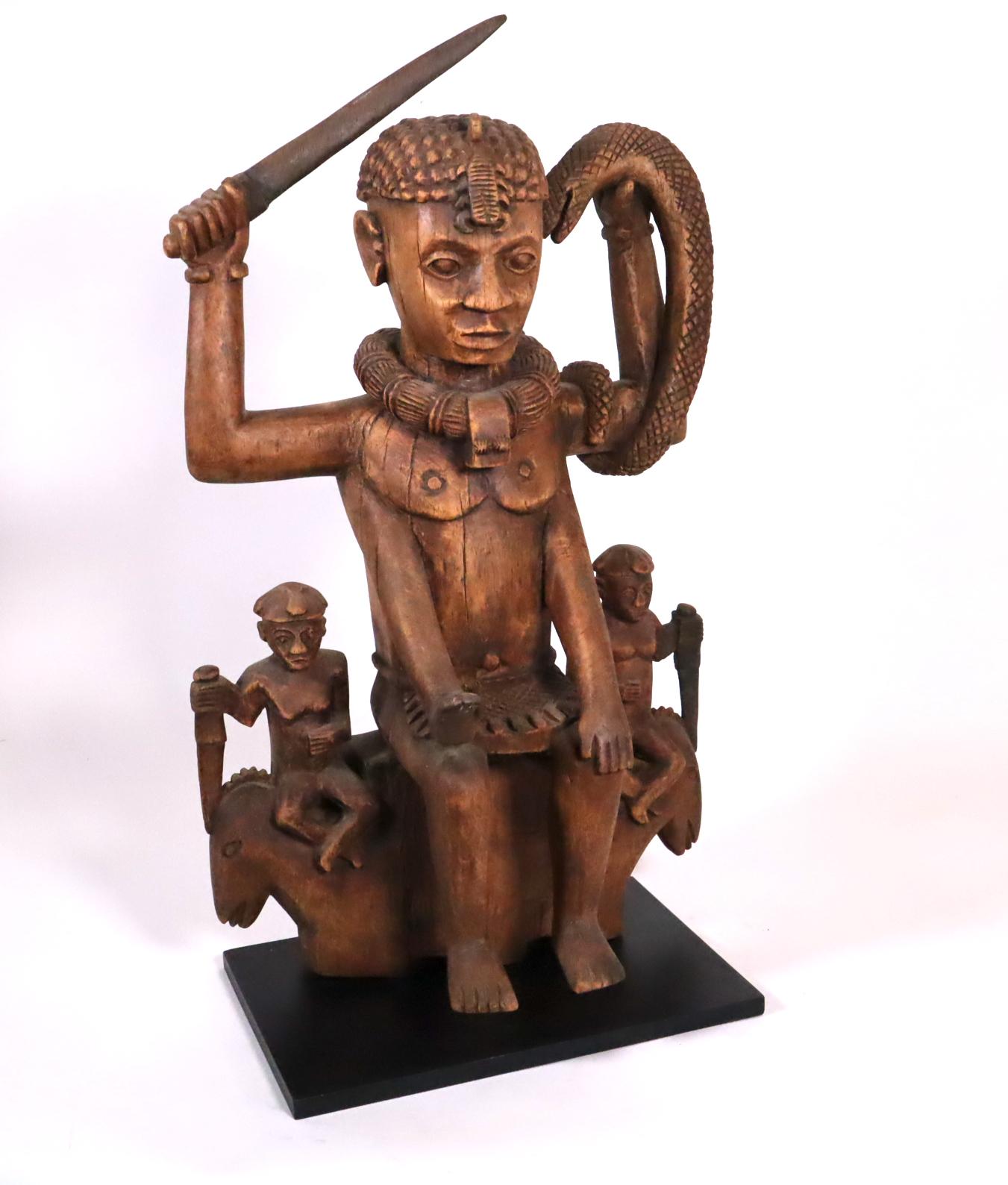 Wood sculpture of a tribal West African Deity Mami Wata derived from Hinduism For Sale 1