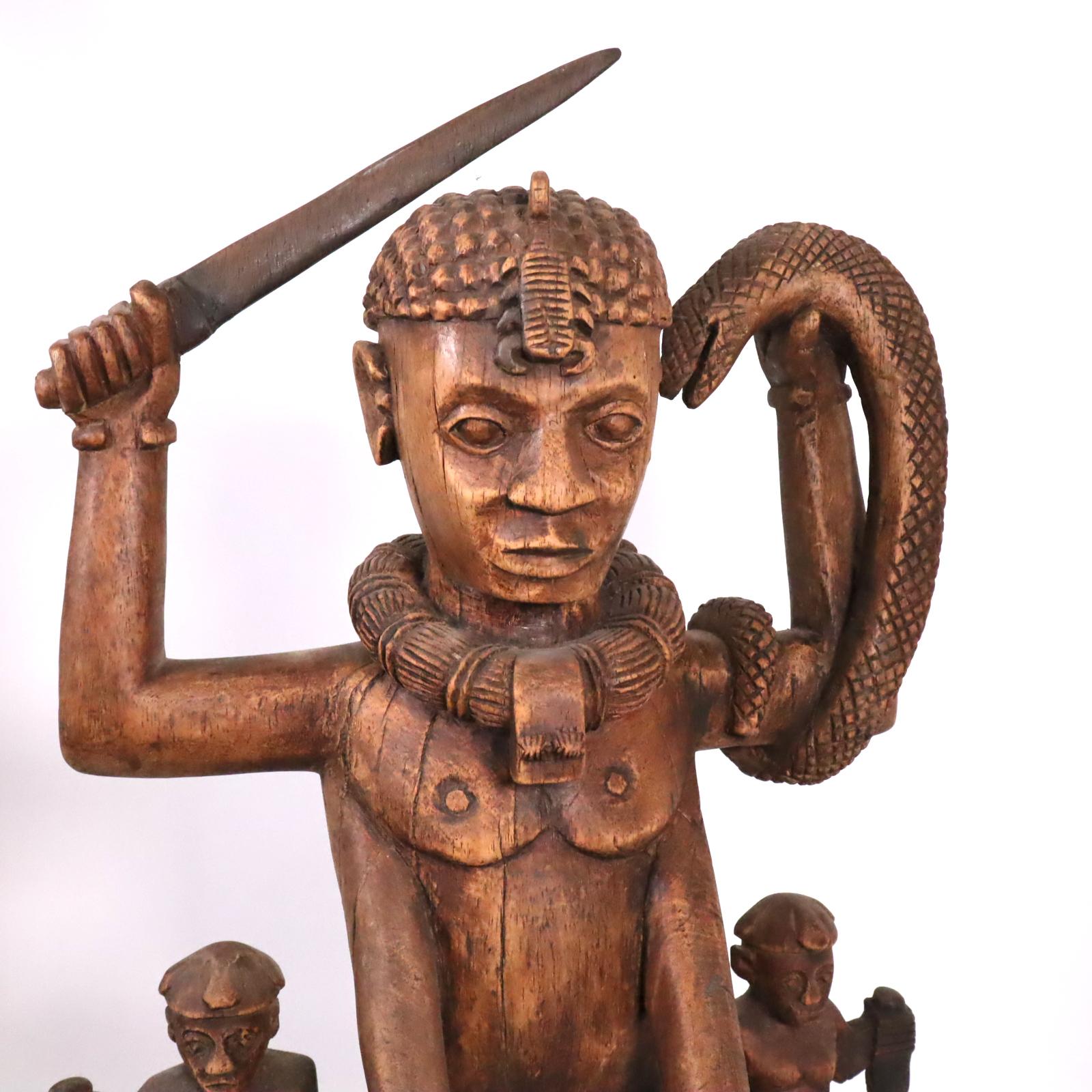 Wood sculpture of a tribal West African Deity Mami Wata derived from Hinduism For Sale 2