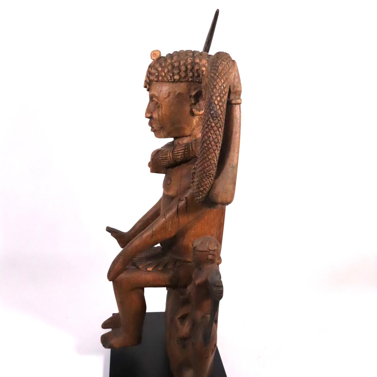 Hand-Carved Wood sculpture of a tribal West African Deity Mami Wata derived from Hinduism For Sale