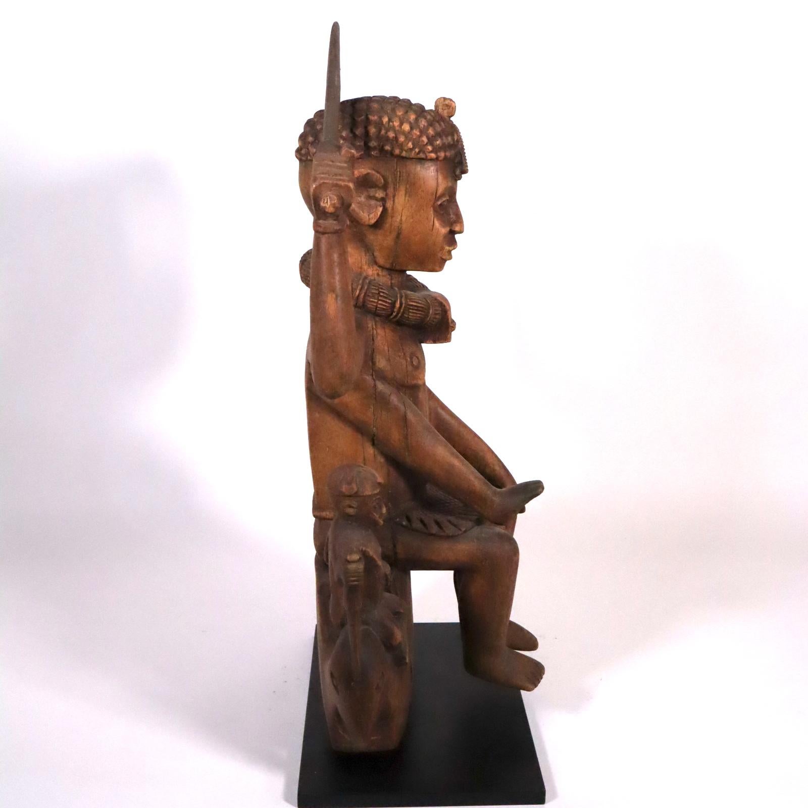 20th Century Wood sculpture of a tribal West African Deity Mami Wata derived from Hinduism For Sale