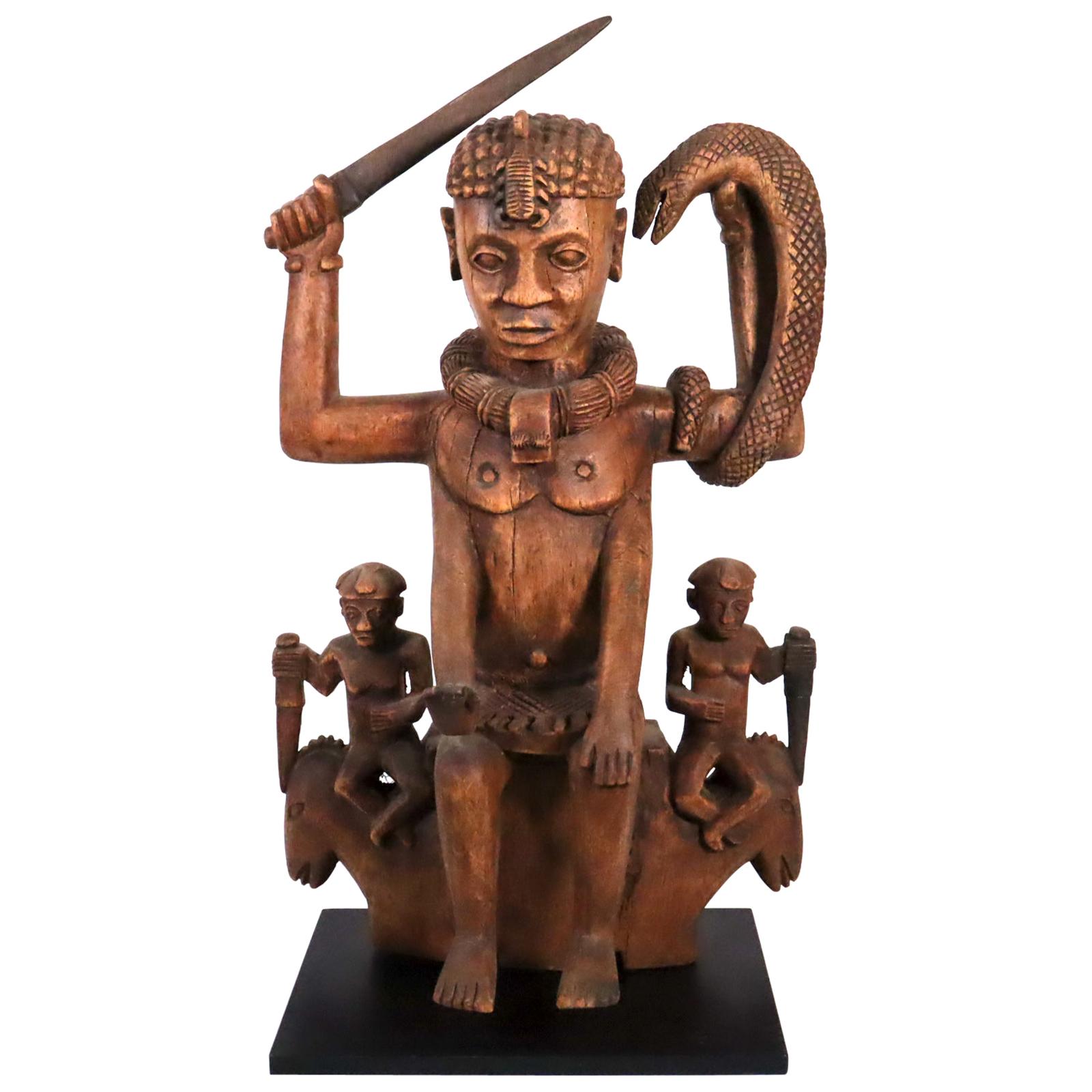 Wood sculpture of a tribal West African Deity Mami Wata derived from Hinduism For Sale