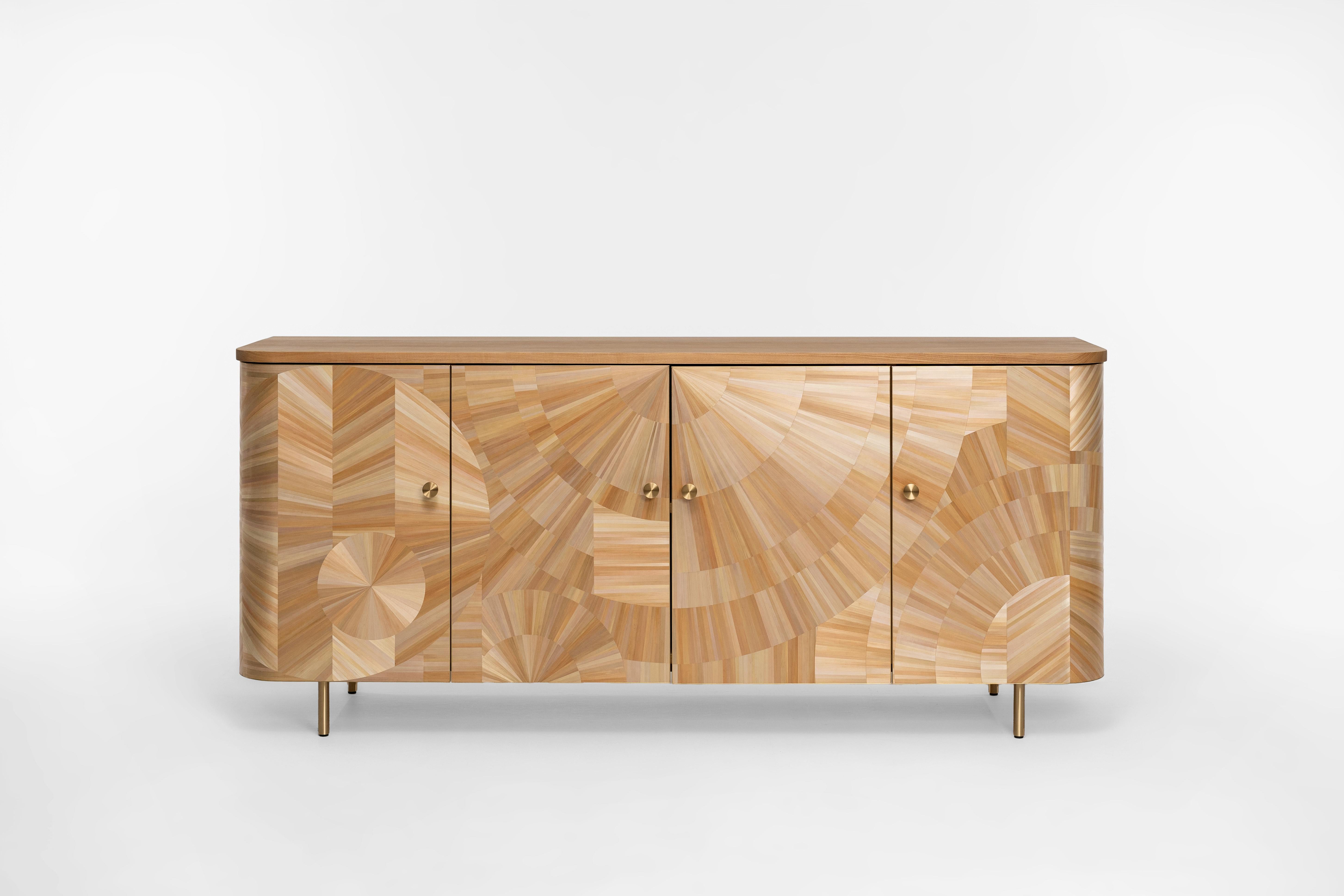 Solomia Cabinet by Ruda Studio
Dimensions: D 45 x W 170 x H 75 cm.
Materials: Solid Ash Wood, Rye Straw Inlay, Plywood, Brass handles and legs.
Weight: 70 kg.

Design brand RUDA Studio was founded in 2017 by Oleksandra Rudenko and Yuriy Vovnyanko.