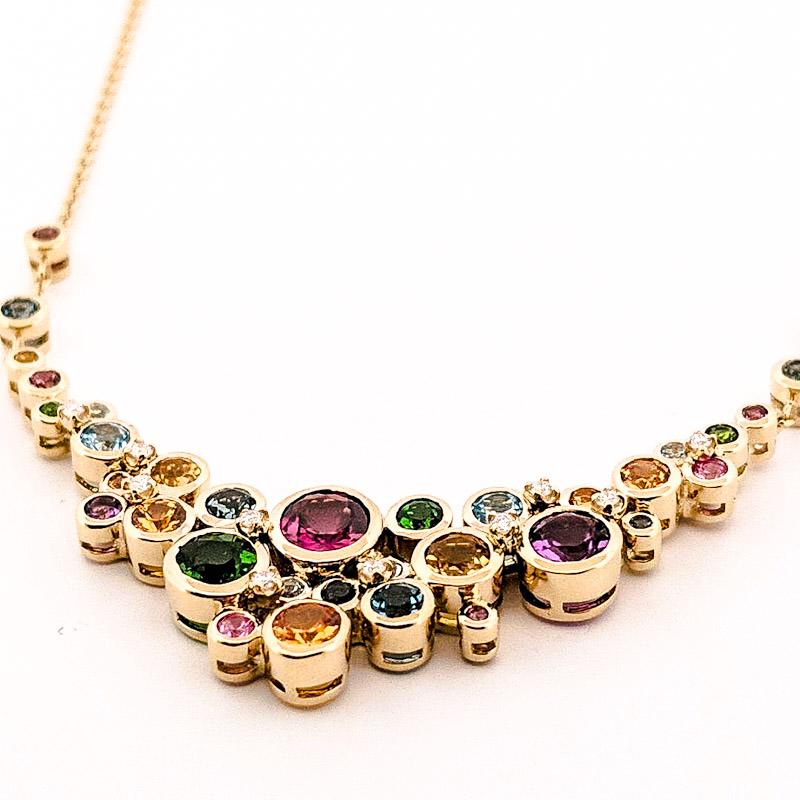 18” necklace made in 14ky with a delicate cable chain and lobster clasp. 

There are 3.5ct of multi-colored gemstones: Spessartites, Chrome Diopside, Rhodolites, Citrines, Amethysts, Blue Topaz, Pink Sapphires, Yellow Sapphires, Tanzanites and 0.1ct