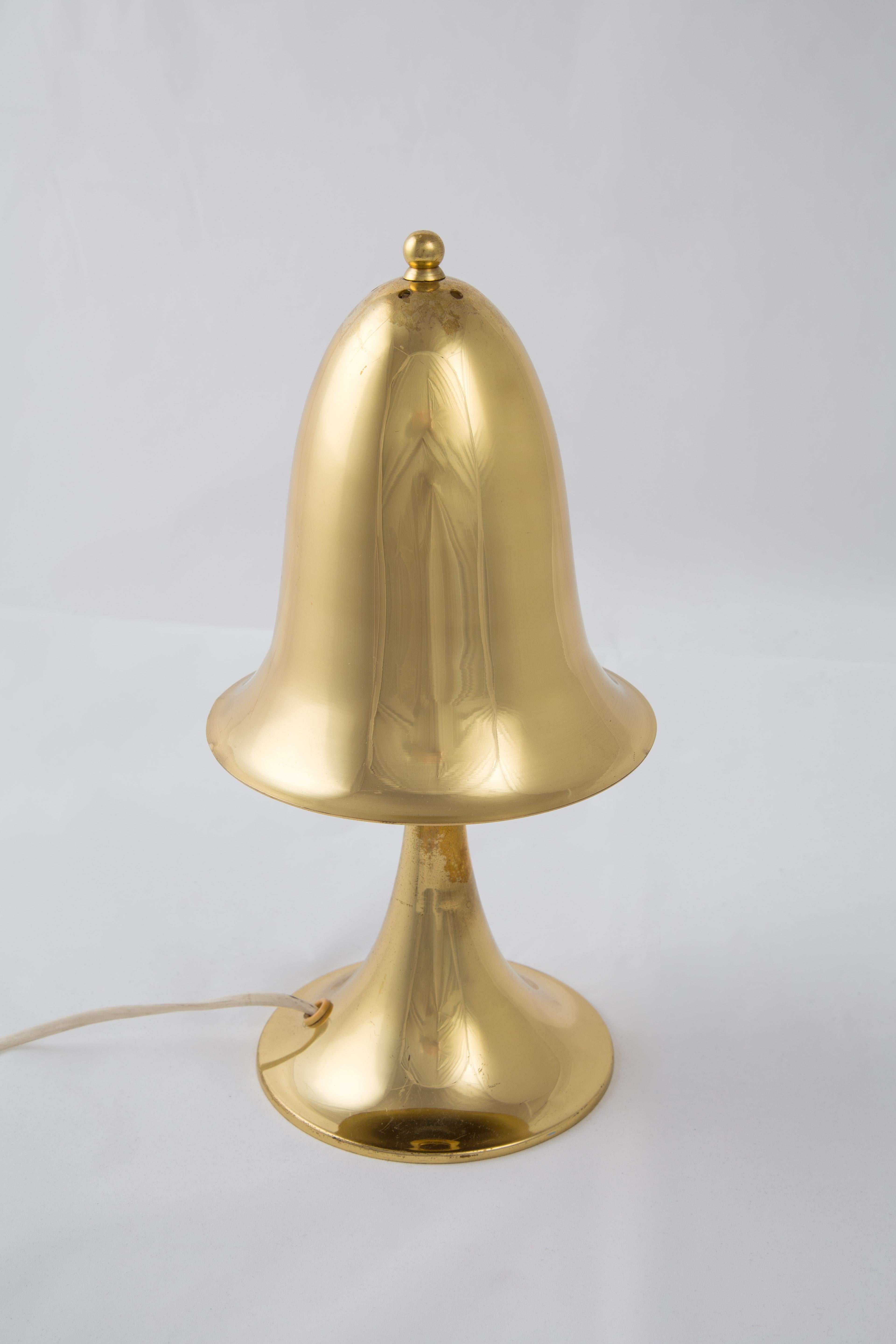 Solve Carlsson Helsingborg brass mushroom lamp. The lamp has the characteristic base of design of Solve Carlsson. It is a fairytale lamp. Perfect shape.
