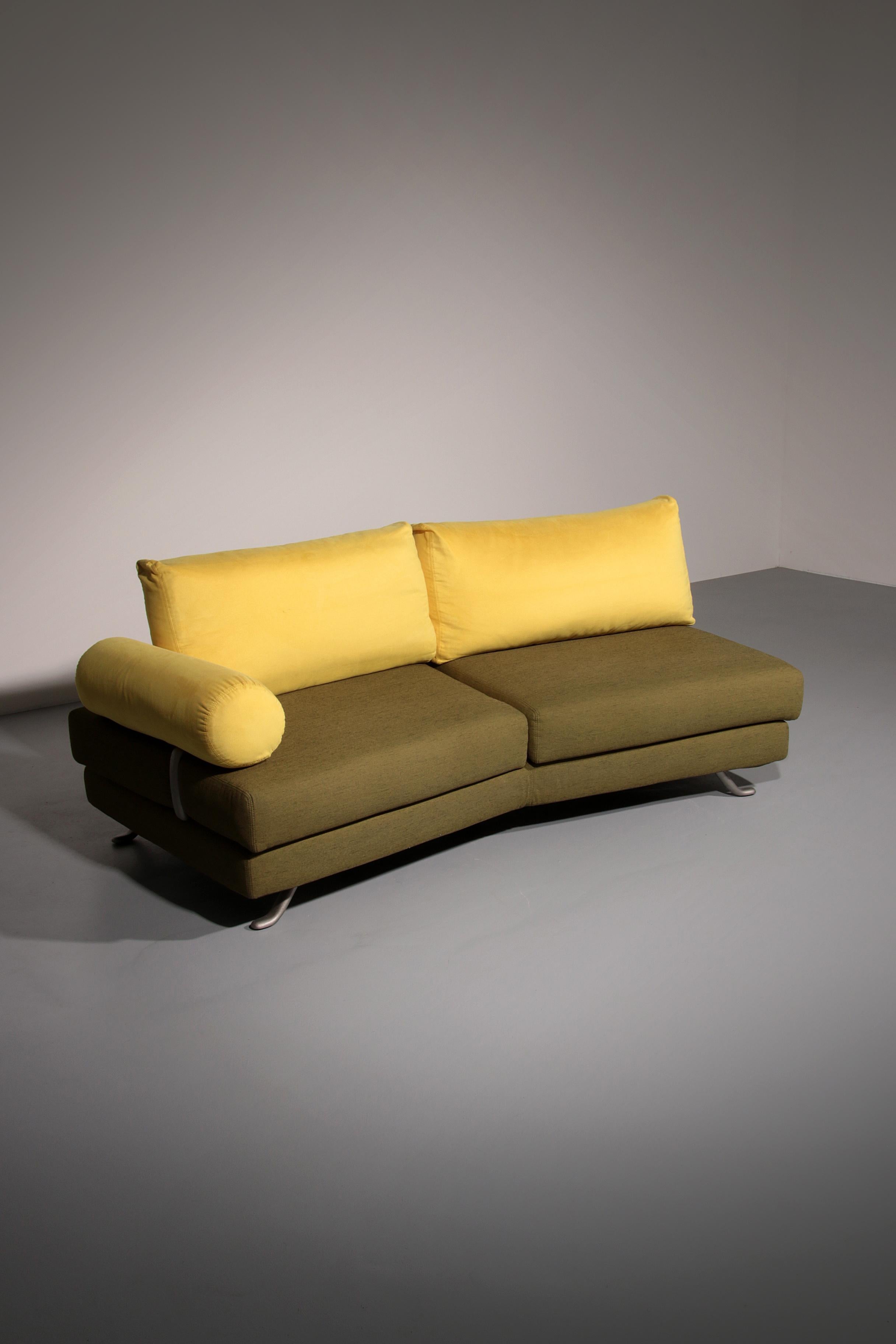 

Designed by Dainelli Studio and crafted by Somaschini, this rare vintage two-seater sofa from the 1970s captures the essence of Italian design excellence. The vibrant lime green frame paired with the warm maize yellow upholstery creates a striking