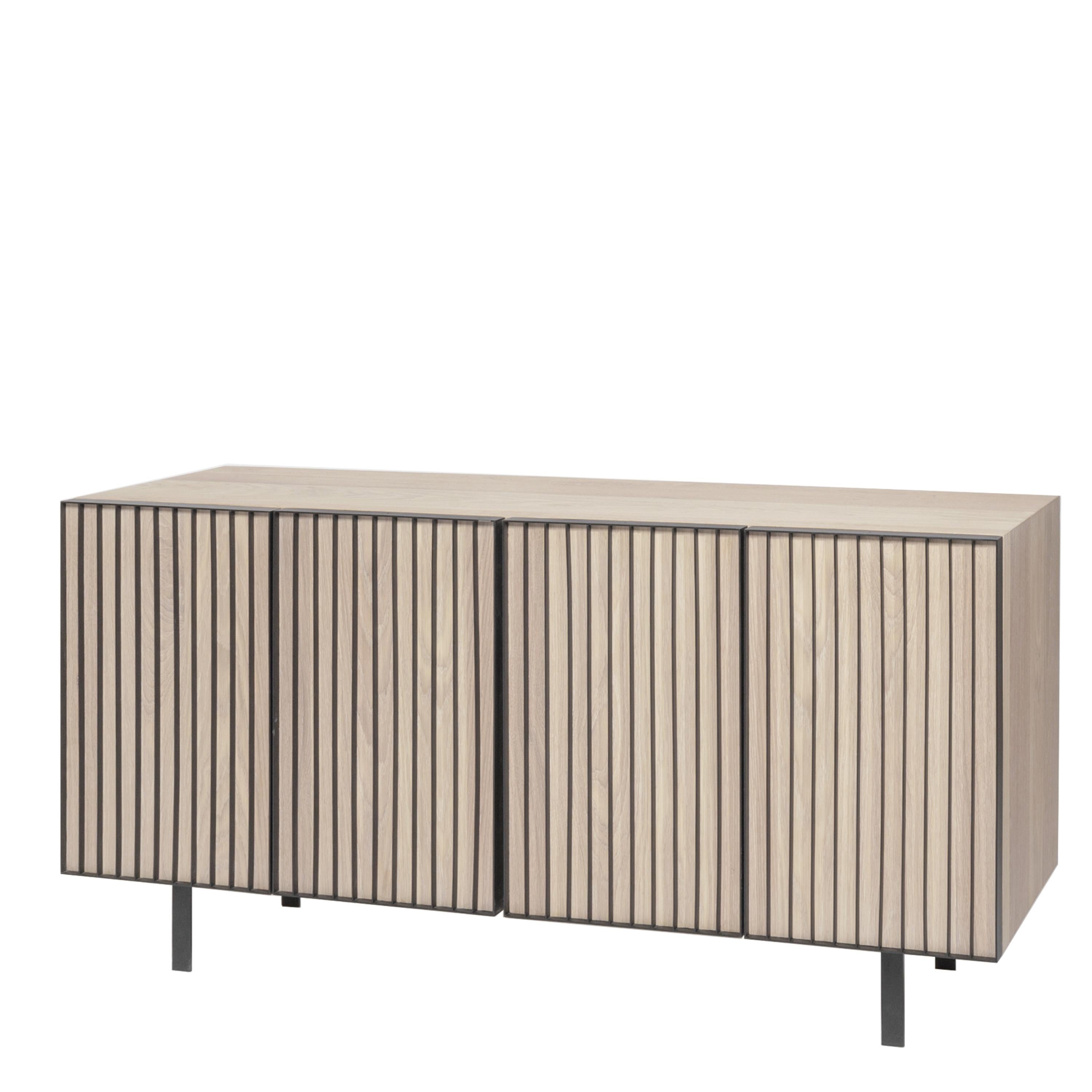 The Credenza Sombra takes inspiration from the quiet architecture of Chipperfield. Composed of steel legs and details on doors and covered in wood veneer, this credenza avoids noise and follows a clean and essential line.  Production time: 6-8 weeks