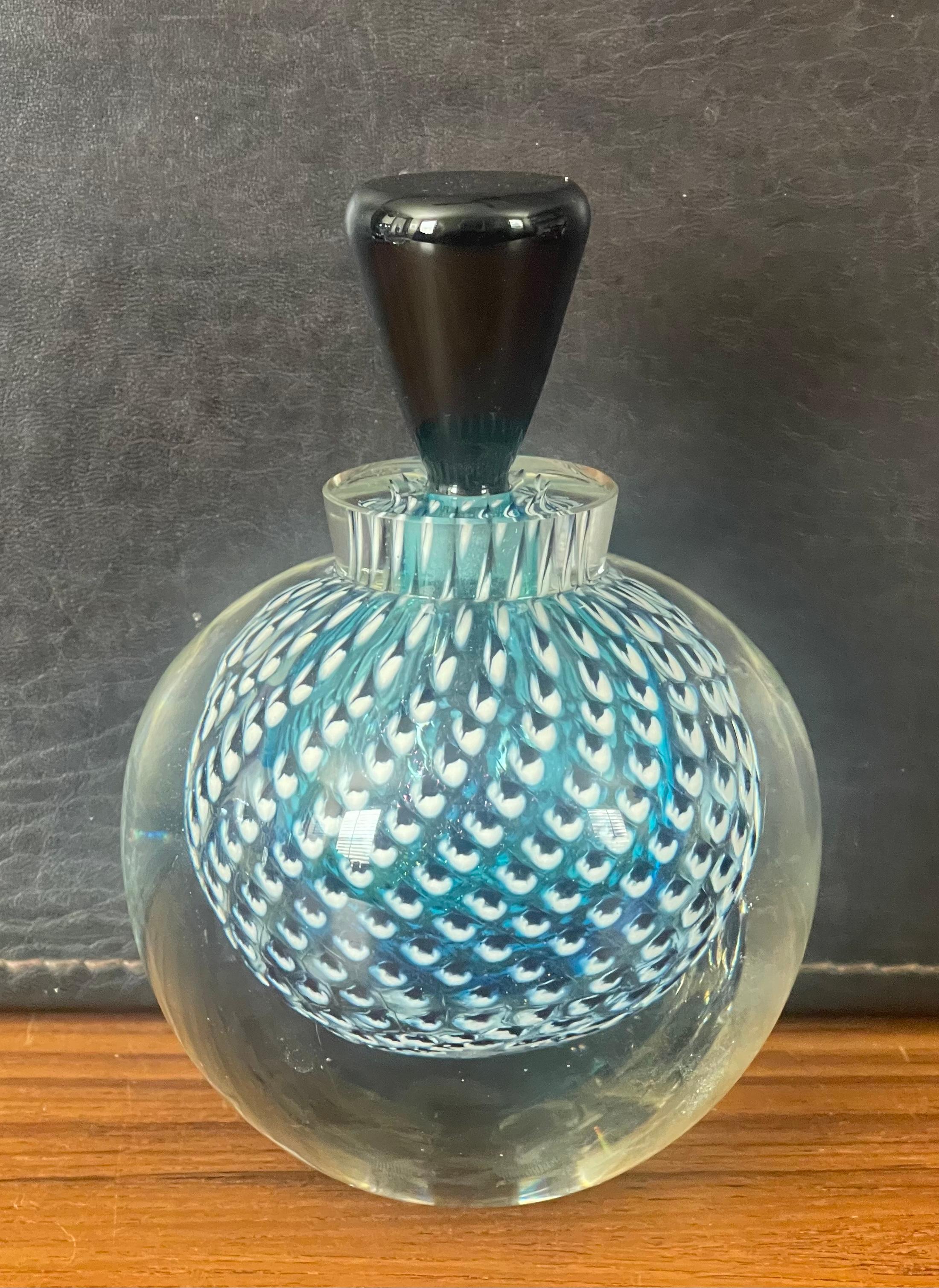 decorative glass bottle with stopper