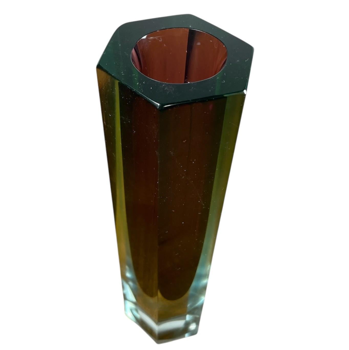 Sommerso vase made of faceted Murano glass in reddish violet