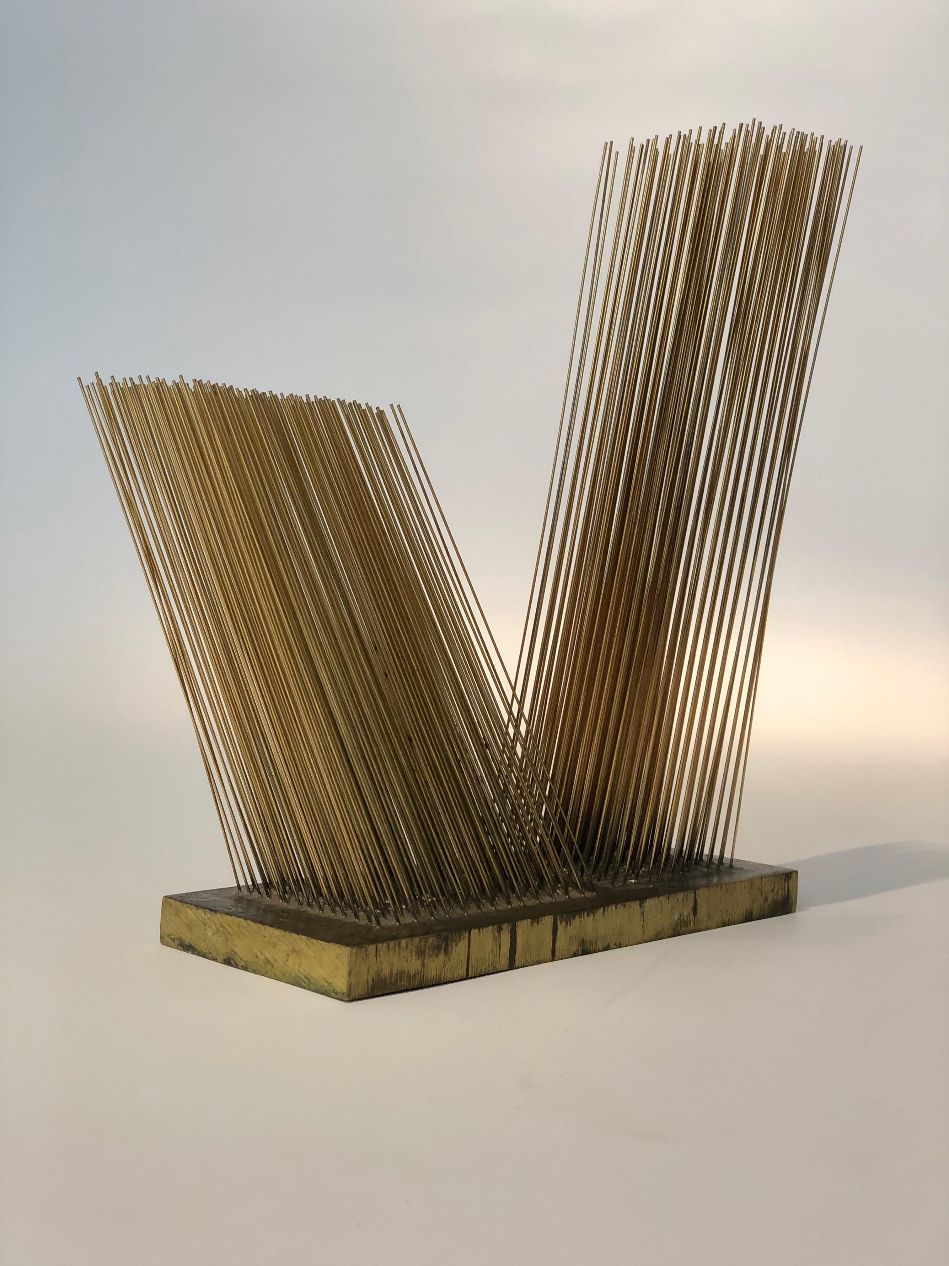 Rare Harry Bertoia sonambient sculpture. Pair of off-axis bronze rod arrays silver soldered onto a solid bronze base, circa 1967. Sold with a certificate of authenticity by the Hary Bertoia Foundation.
Provenance: Obelisk Gallery, Boston Aquired