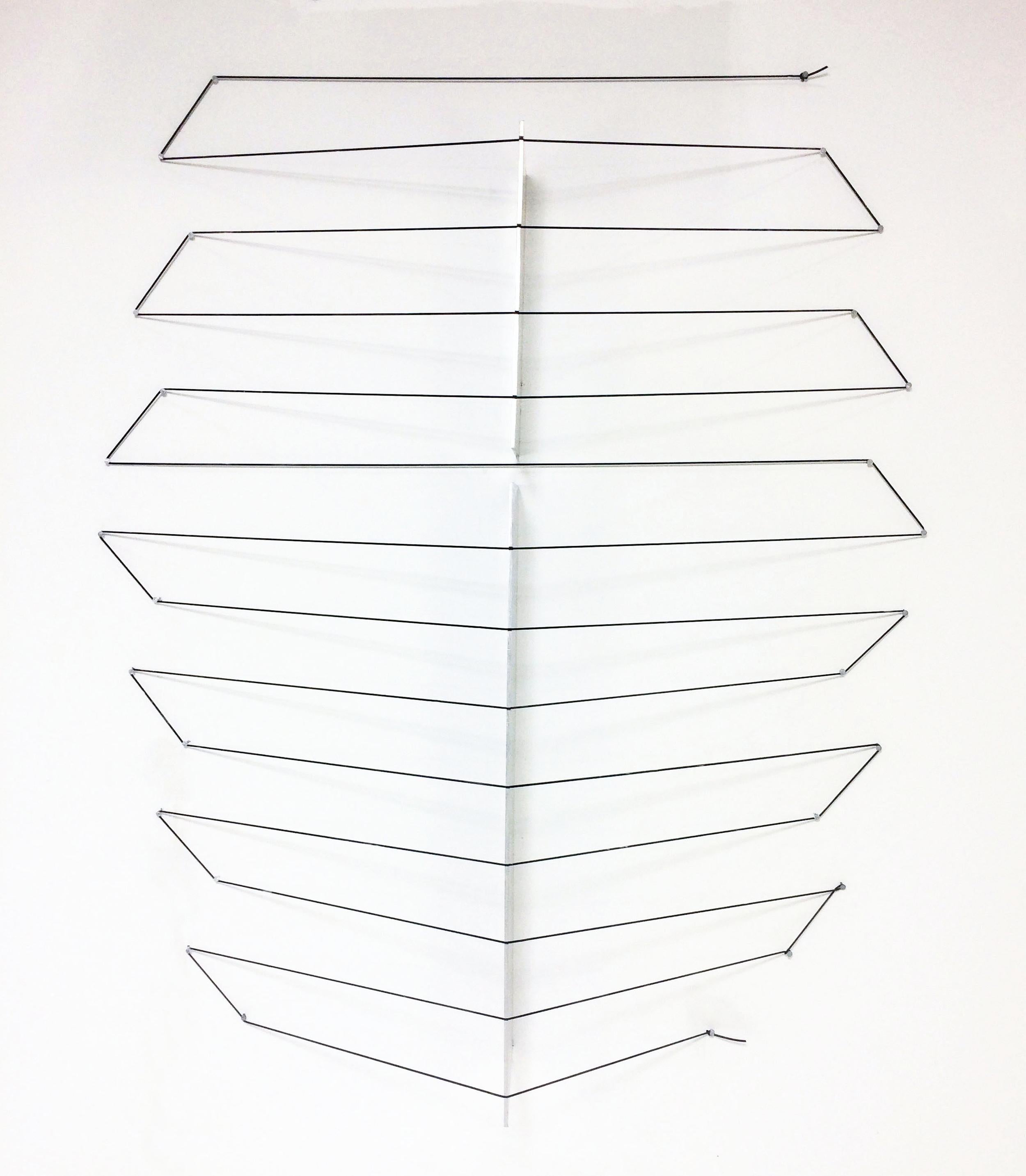 Sonambient wall mounted sculpture by Carol Kreeger Davidson, dated 1975.. Aluminum, neoprene, and flooring nails. 

Davidson (1929-2014) was an accomplished Post-minimalist artist best known for her work in folded paper and bronze. She was