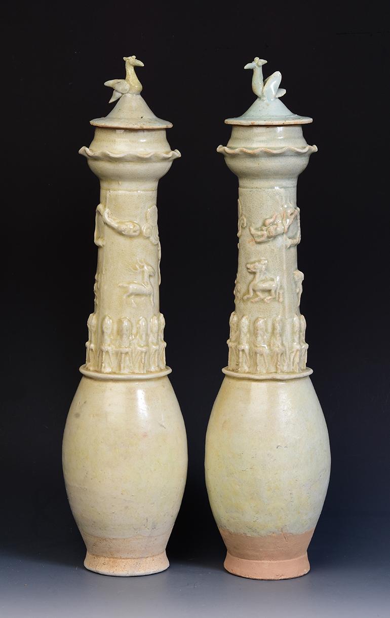 A pair of antique Song Dynasty porcelain olive green vases decorated with gods around the vase and flying dragon on top of each vase. 
Each lid decorated with crane on the top.

Age: China, Song Dynasty, 10th - 13th Century
Size: Height 49.5 C.M. /