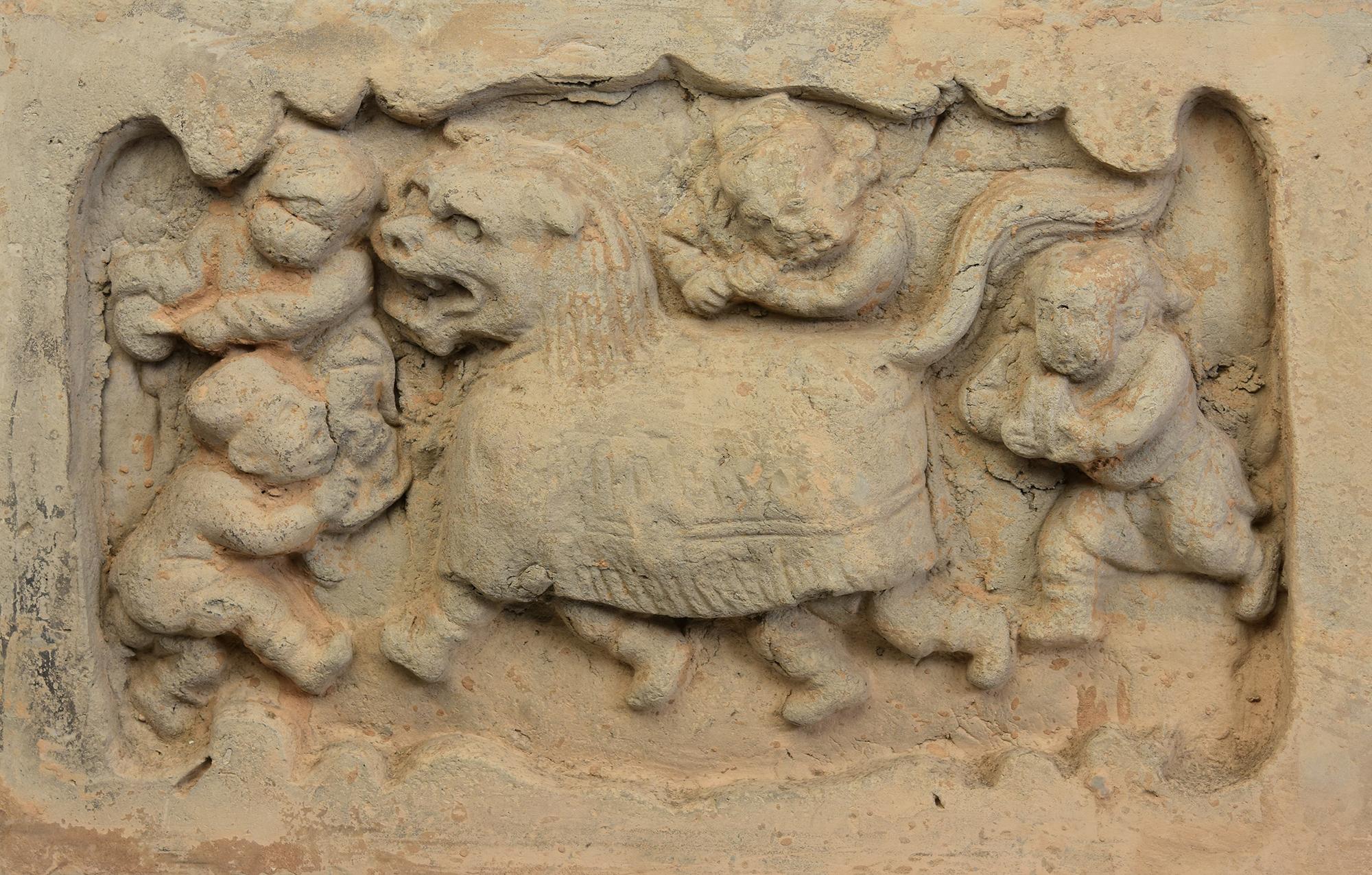 A pair of antique Chinese pottery brick tile with lion and figures.

Age: China, Song Dynasty, 10th - 12th Century
Size of panels only: Height 21.3 C.M. / Width 32.8 - 33 C.M. / Thickness 3.6 C.M.
Height including stand: 40 - 40.3 C.M.
Condition: