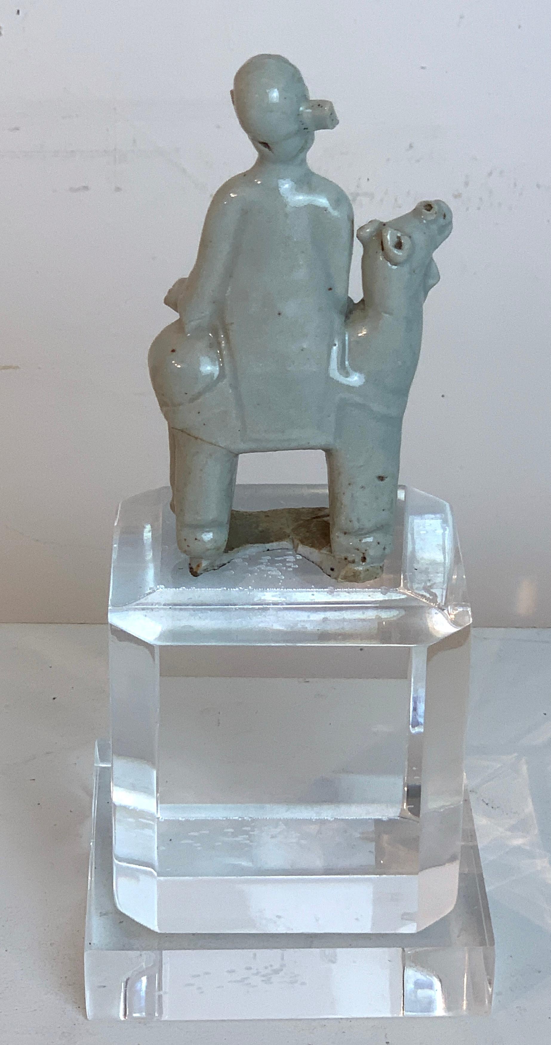 18th Century and Earlier Song Dynasty Chinese Celadon Porcelain Horse and Rider on Later Lucite Pedestal For Sale